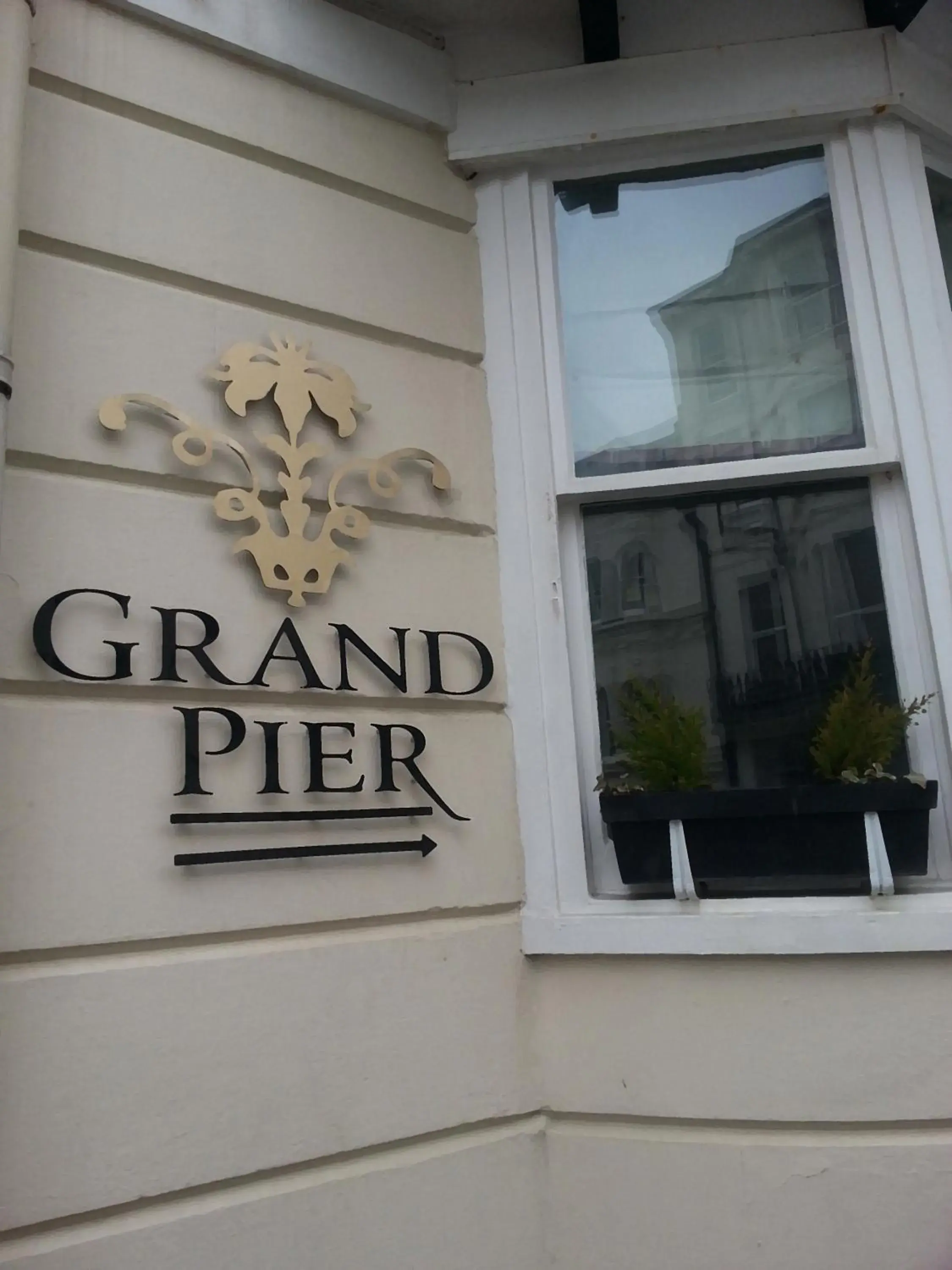 Facade/entrance in Grand Pier Guest House