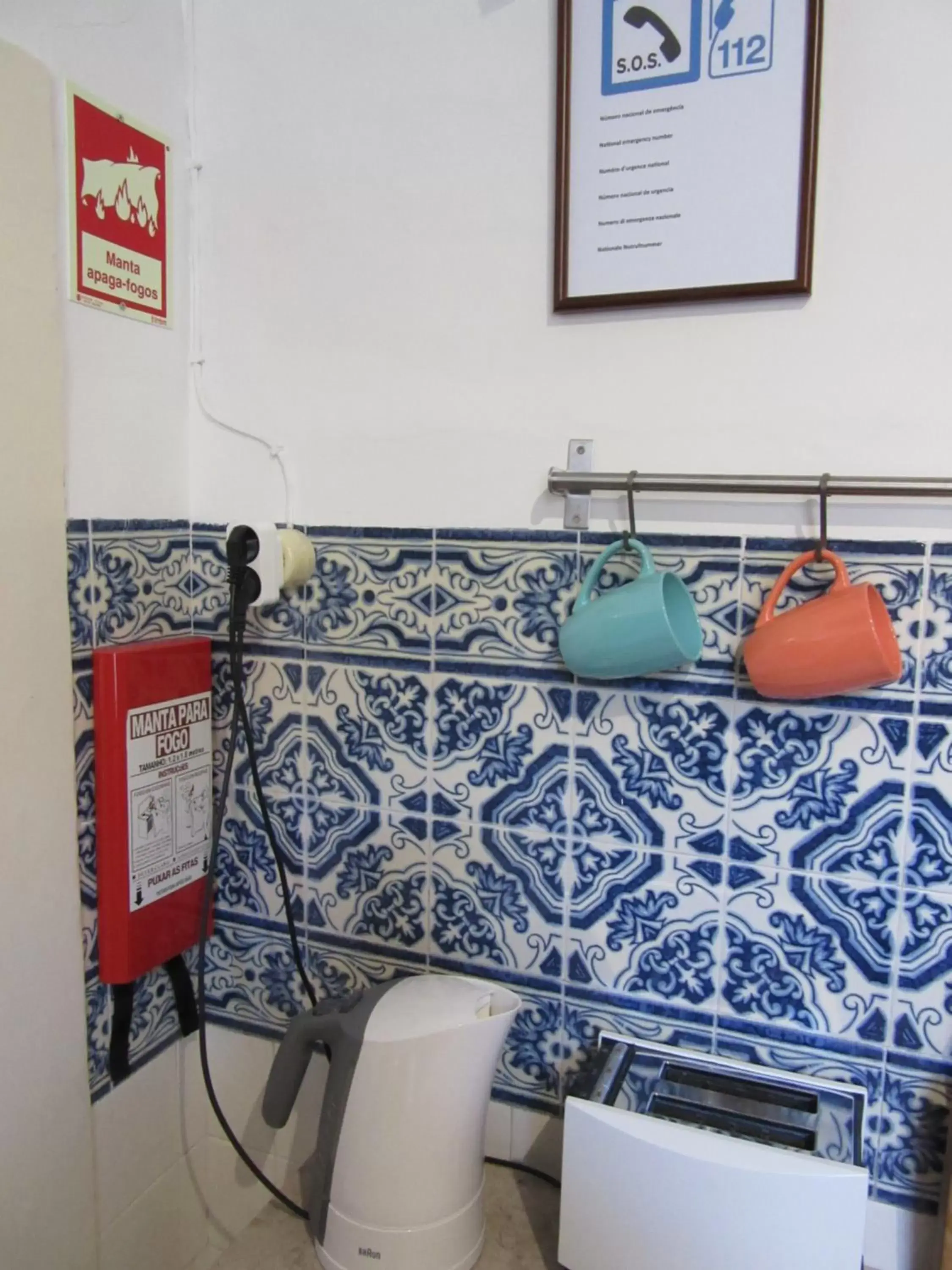 Communal kitchen, Bathroom in Family Macedo