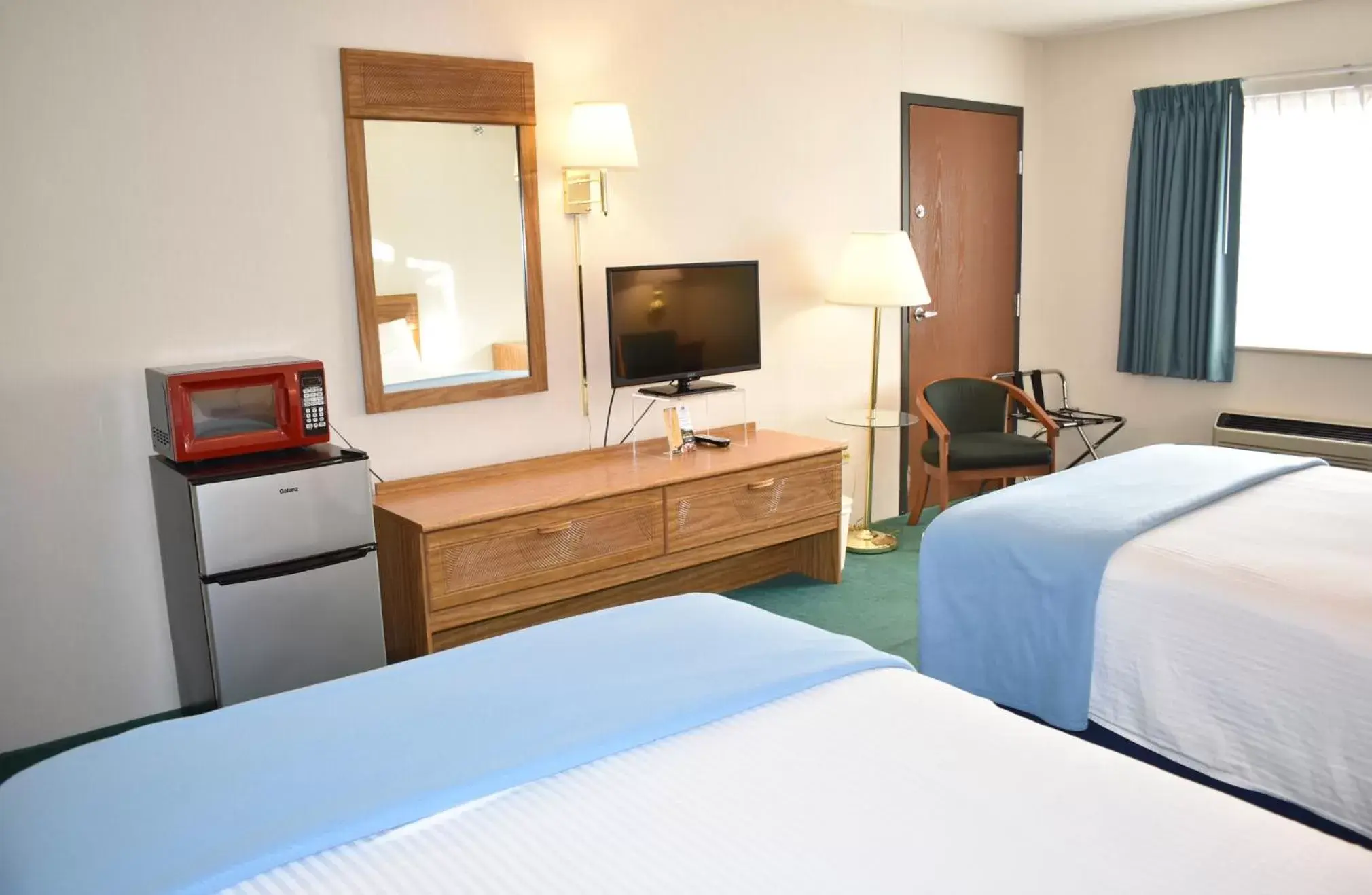 TV/Entertainment Center in Americas Best Value Inn & Suites - Tahquamenon Country