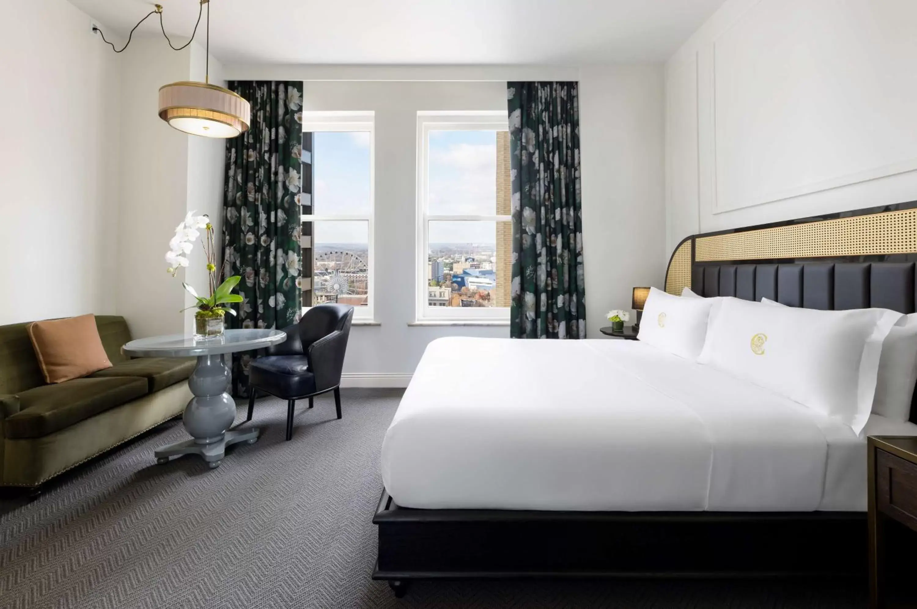 Living room, Bed in The Candler Hotel Atlanta, Curio Collection by Hilton Living room, Bed in The Candler Hotel Atlanta, Curio Collection by Hilton