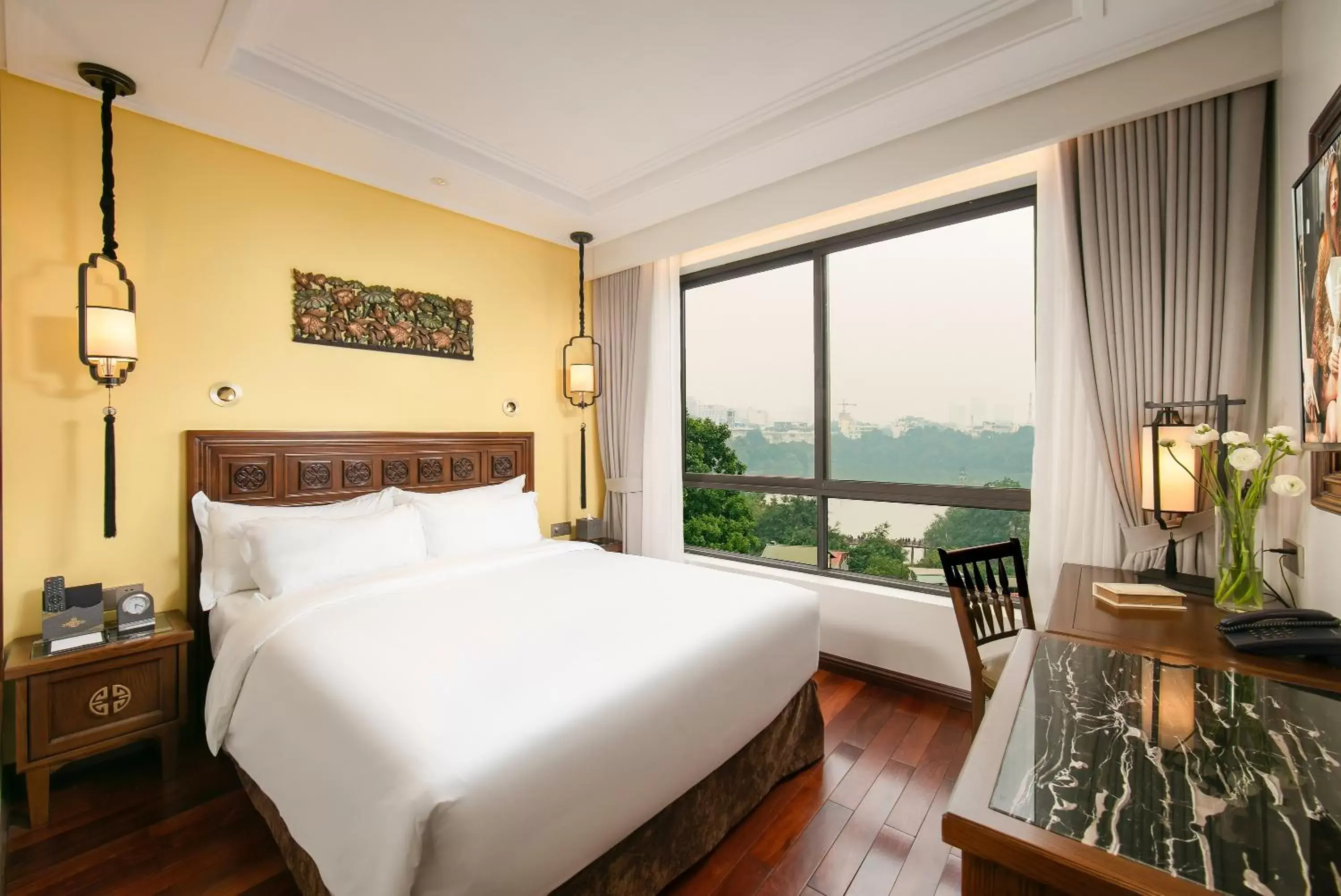 Bed in Lucien Hanoi Lakeside Hotel & Rooftop Bed in Lucien Hanoi Lakeside Hotel & Rooftop