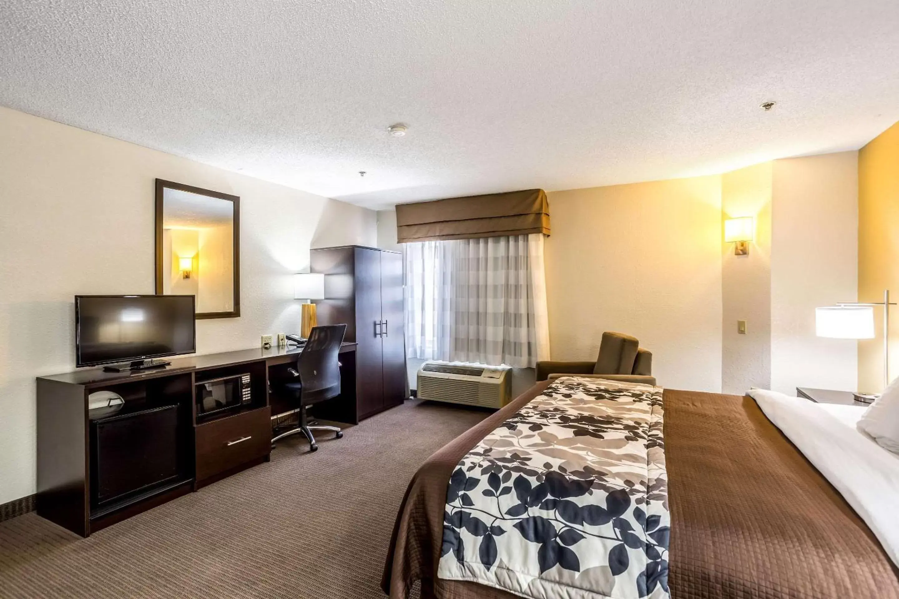 Photo of the whole room, TV/Entertainment Center in Sleep Inn Owensboro