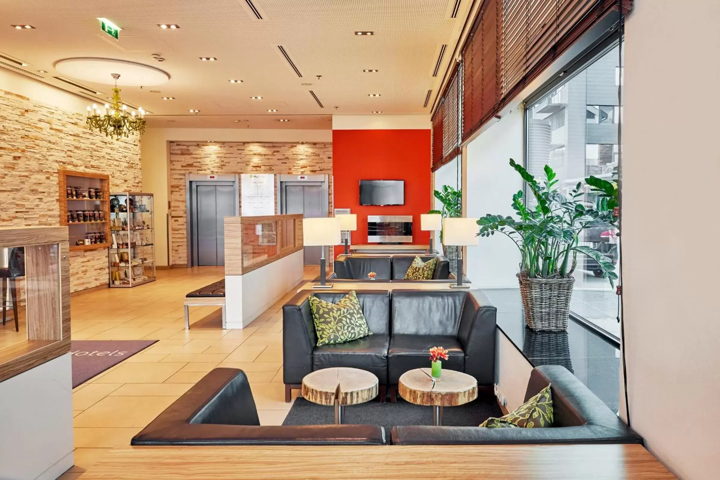 Lobby or reception in H+ Hotel Salzburg Lobby or reception in H+ Hotel Salzburg