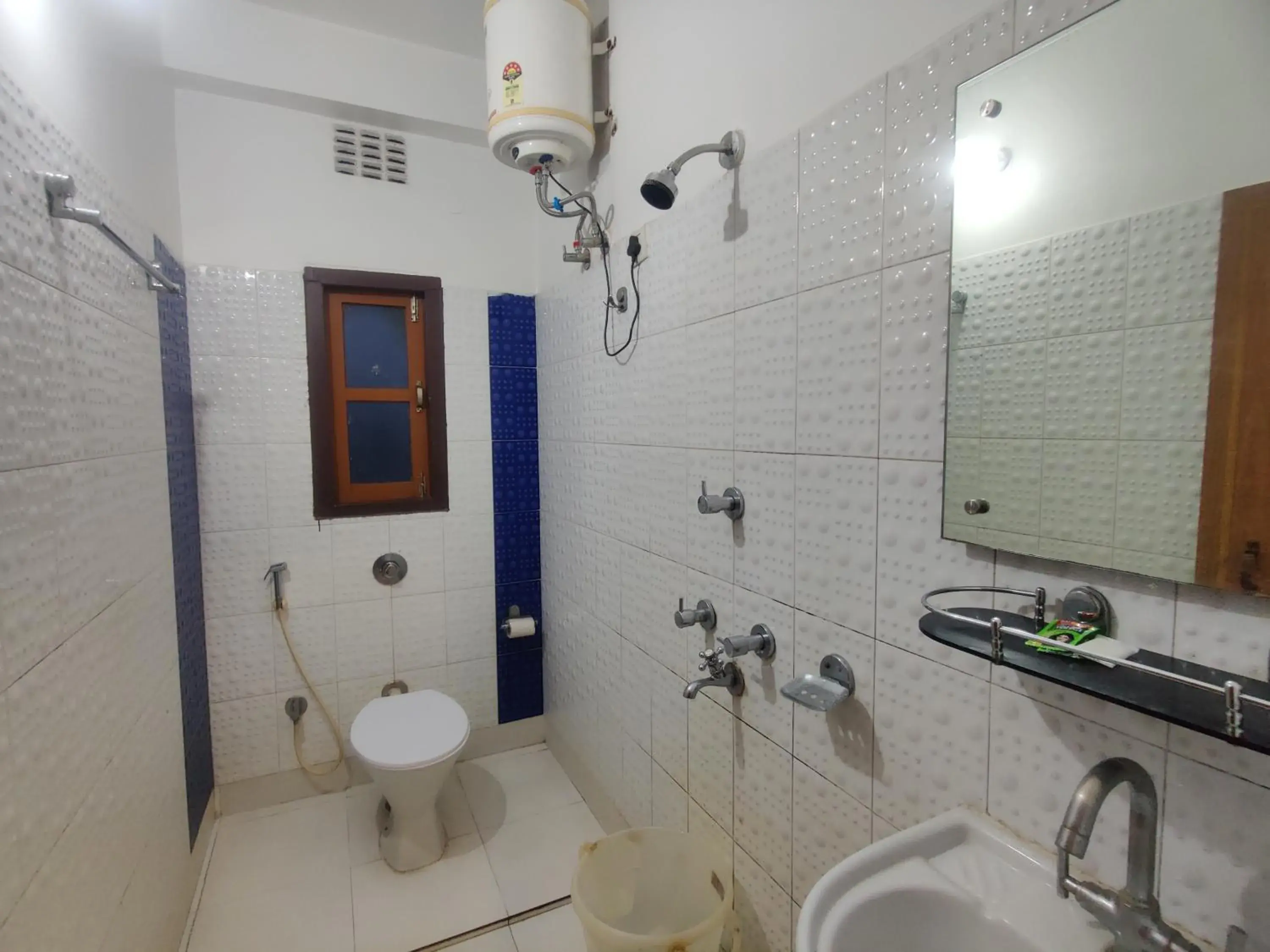 Bathroom in Hotel Swastik Regency