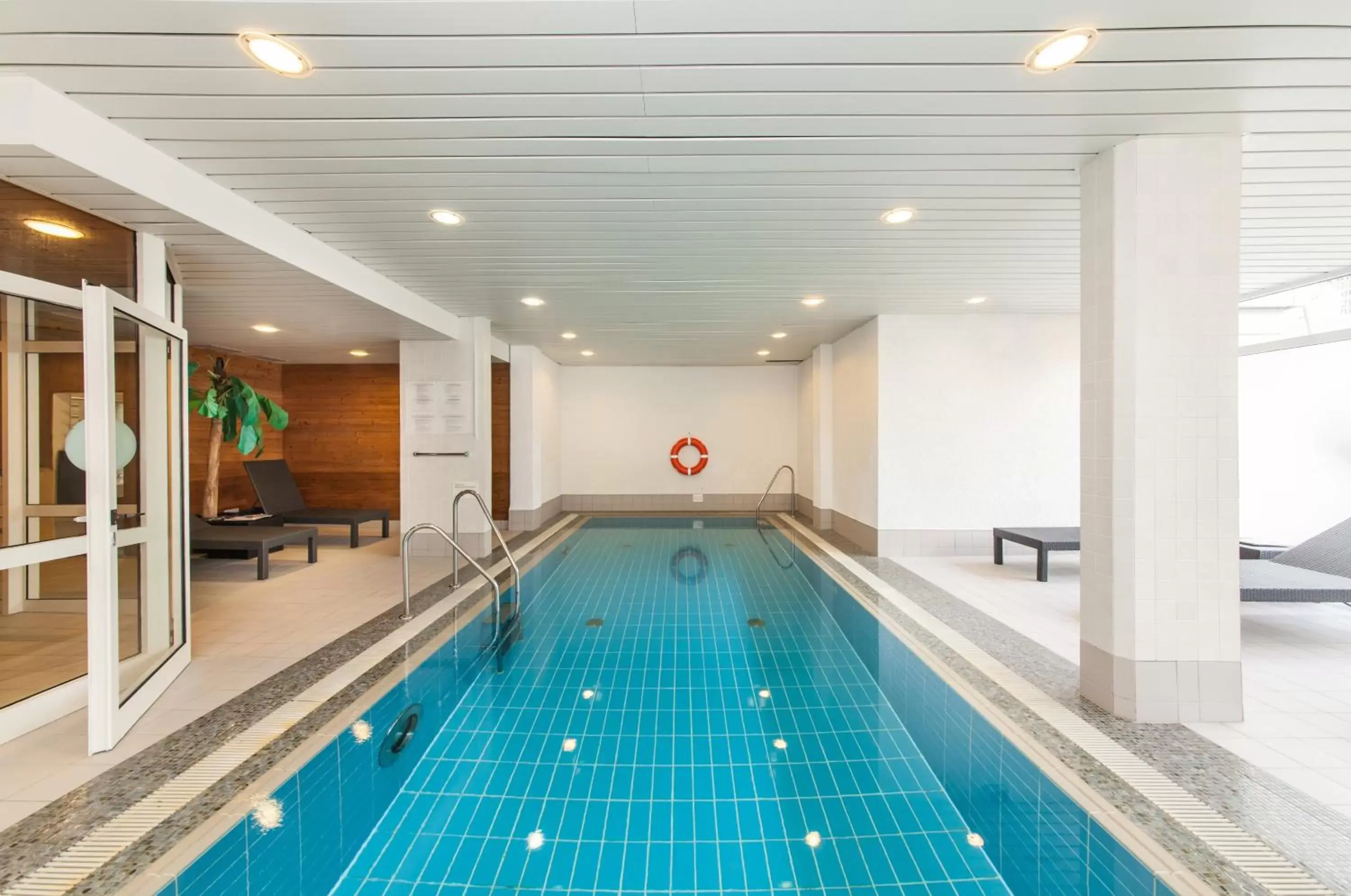 Swimming Pool in Holiday Inn München Süd, an IHG Hotel