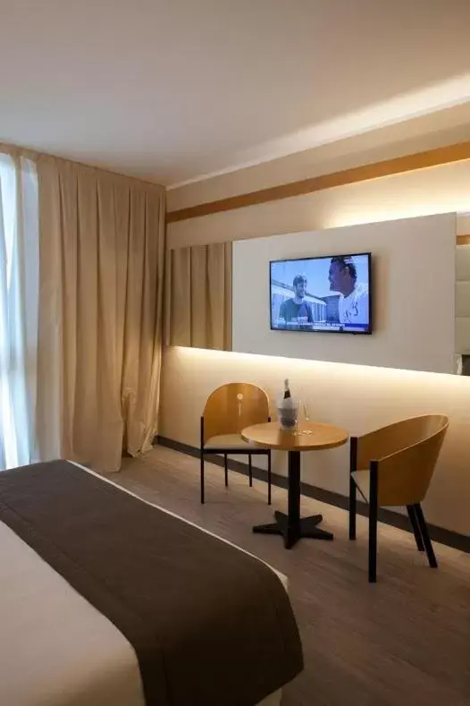 TV/Entertainment Center in Park Hotel Ai Pini & Restaurant Ai Pini