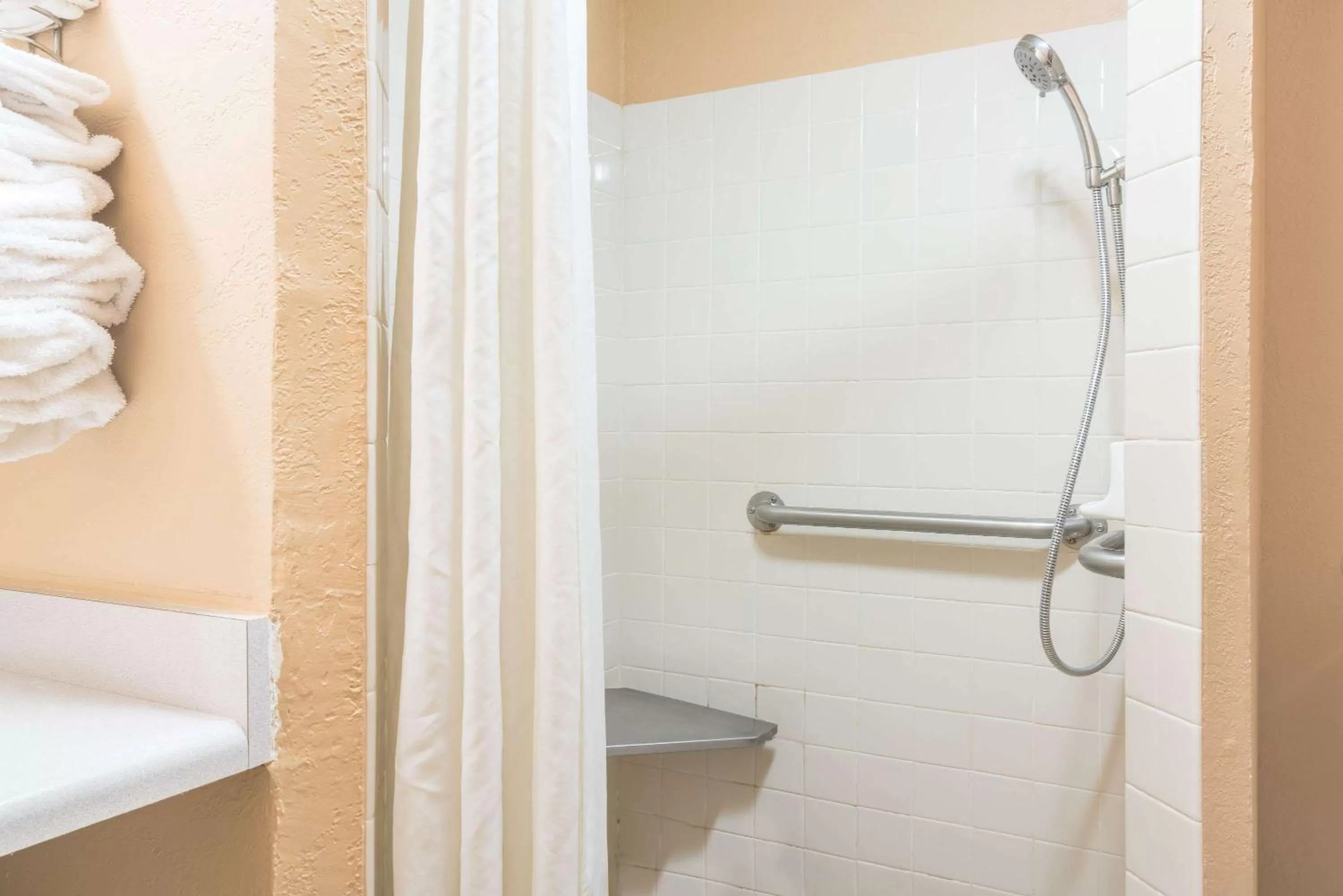 Bathroom in Super 8 by Wyndham Brooklyn Center/MPLS