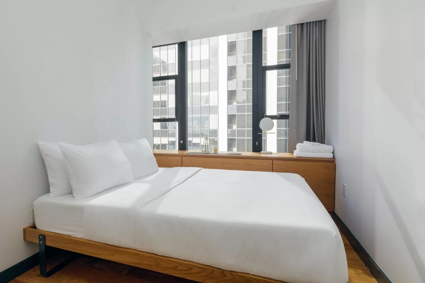 Bed in Placemakr Wall Street