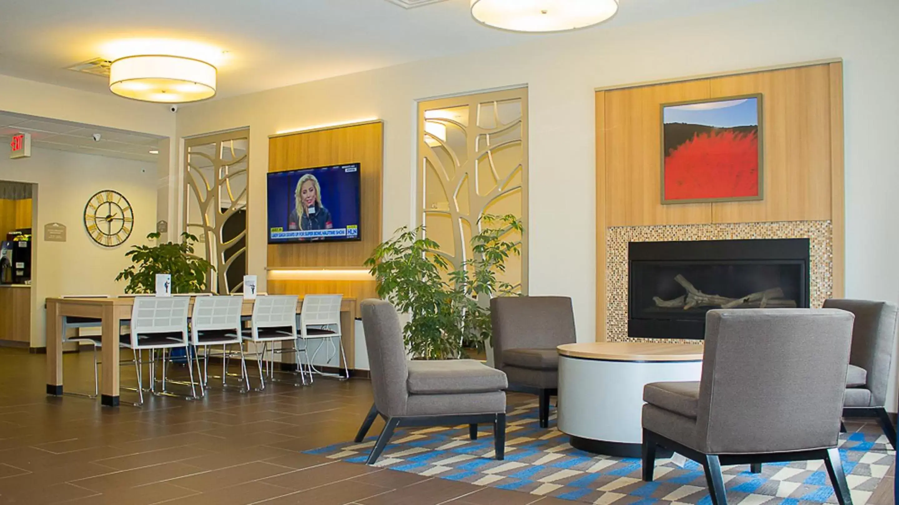 Communal lounge/ TV room, Seating Area in Microtel Inn & Suites by Wyndham - Penn Yan