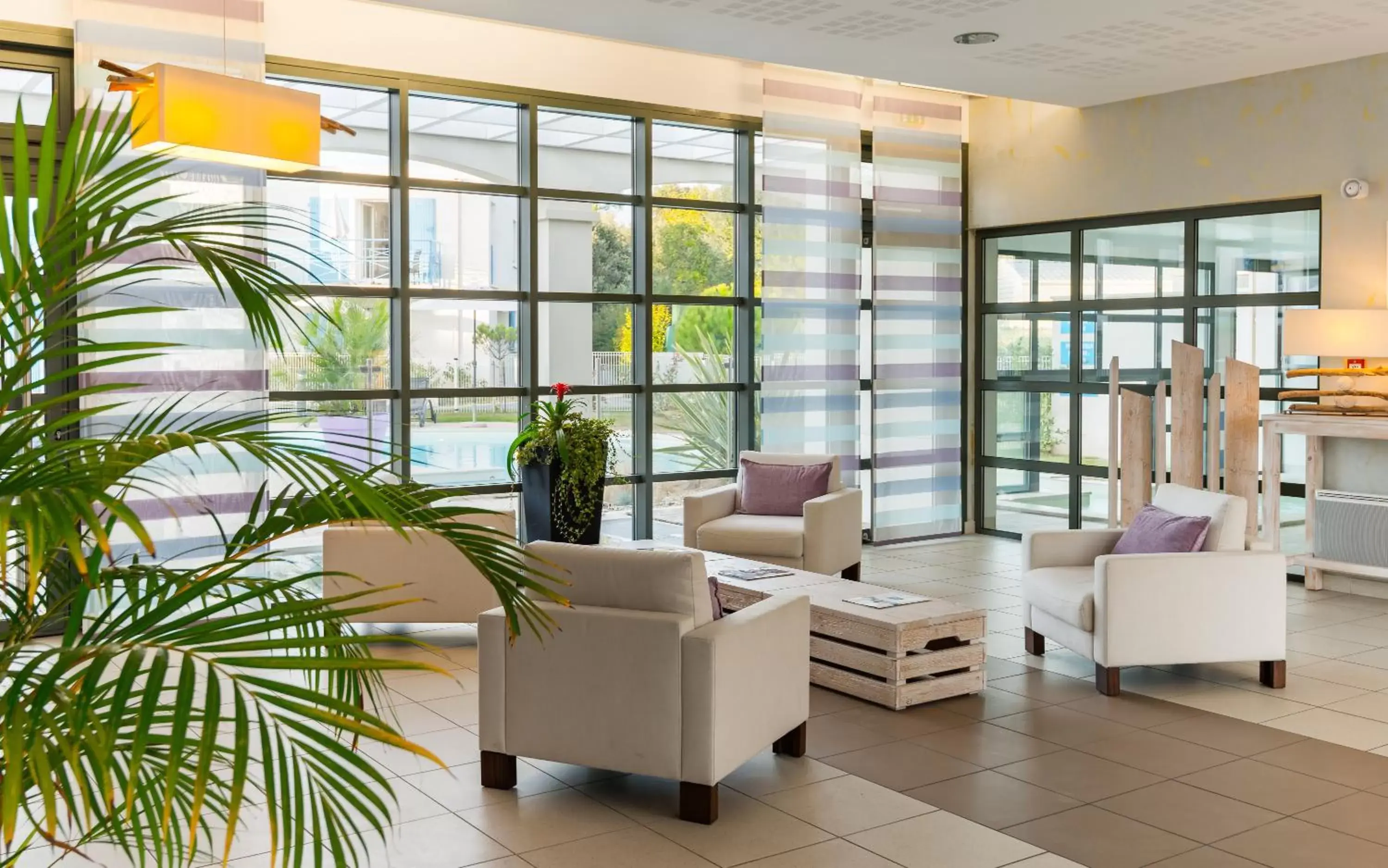 Lobby or reception in Lagrange Vacances Les Carrelets Lobby or reception in Lagrange Vacances Les Carrelets