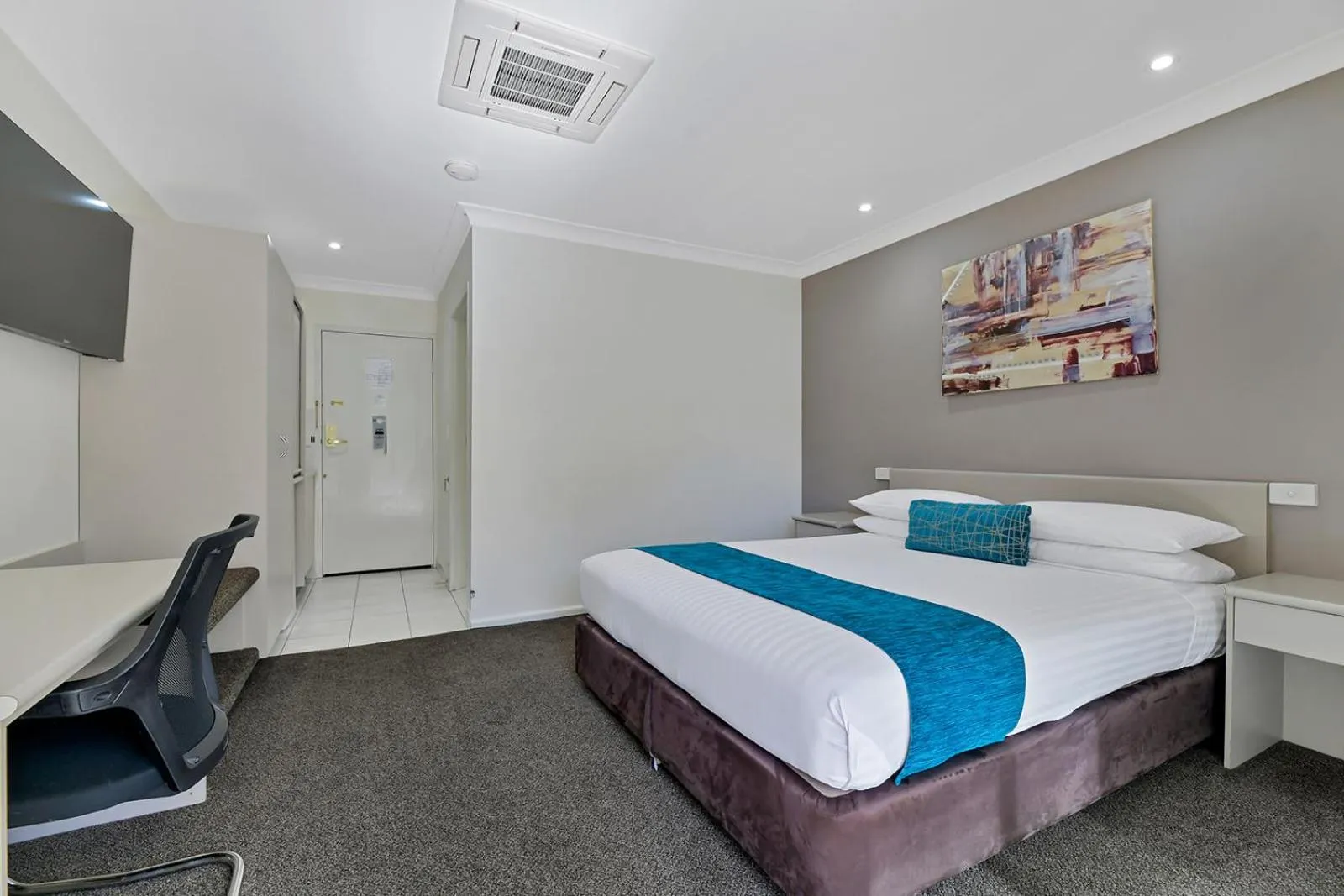 Bed in Central Caleula Motor Lodge