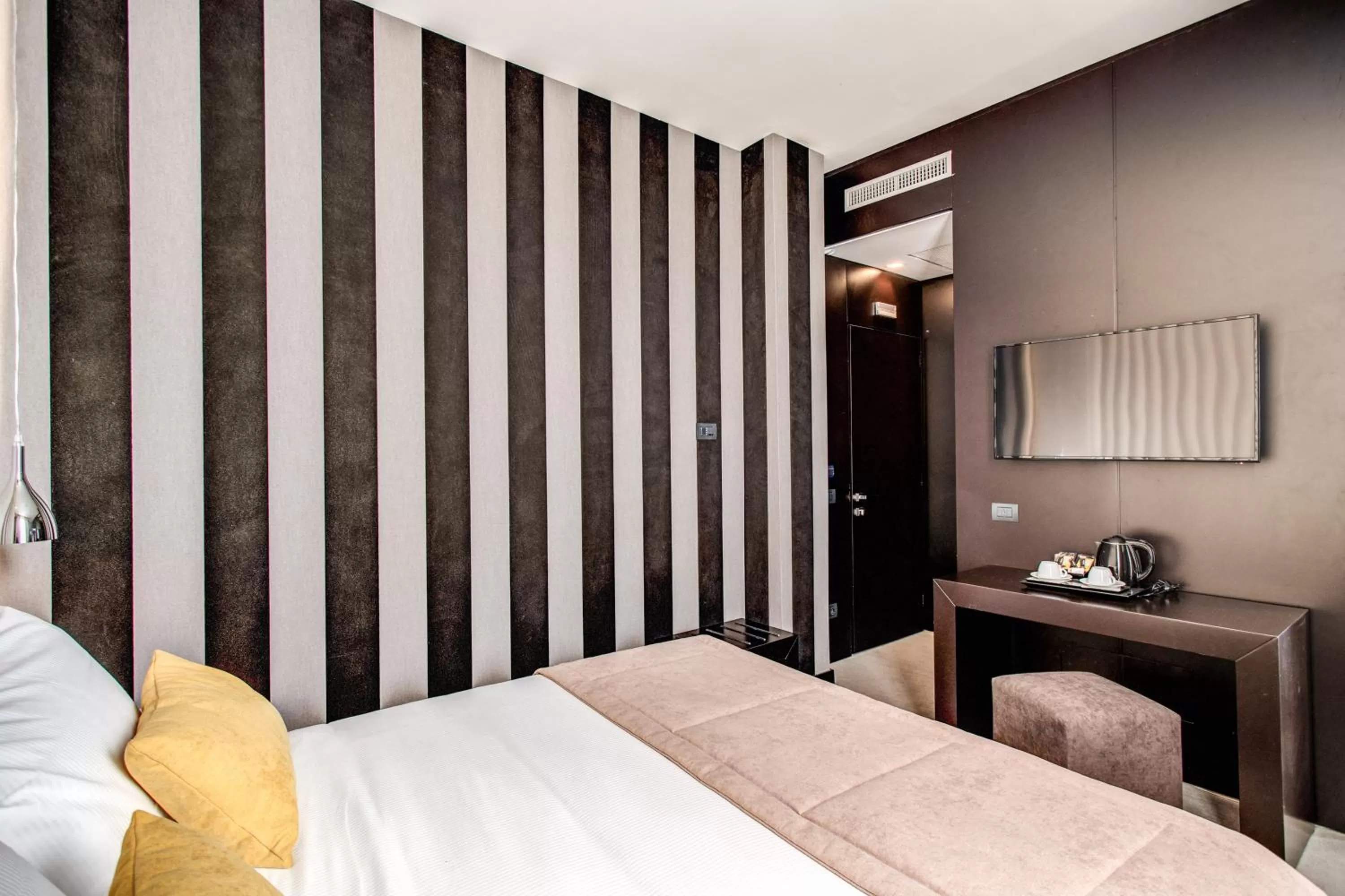 Bed in Doria Palace Boutique Hotel