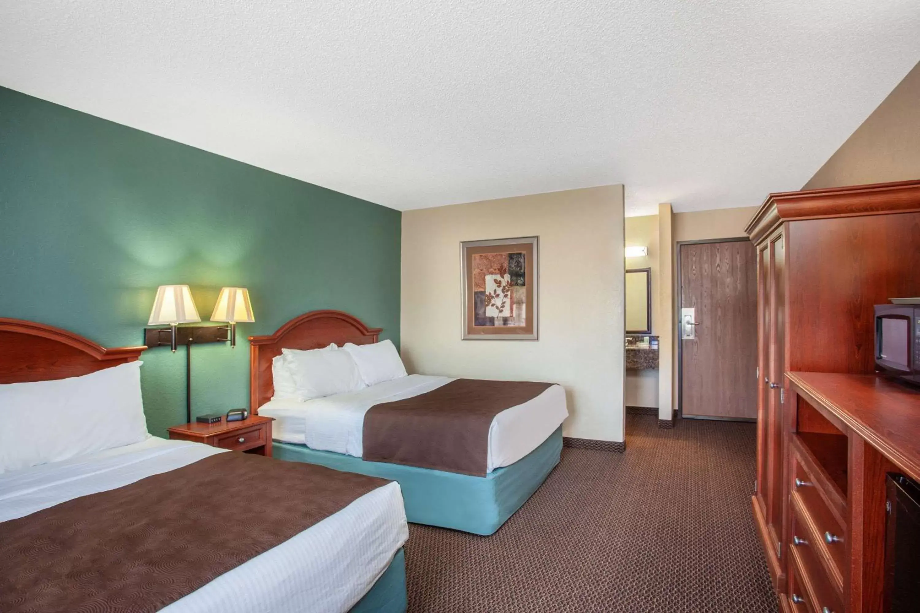 Photo of the whole room, Bed in AmericInn by Wyndham St. Peter