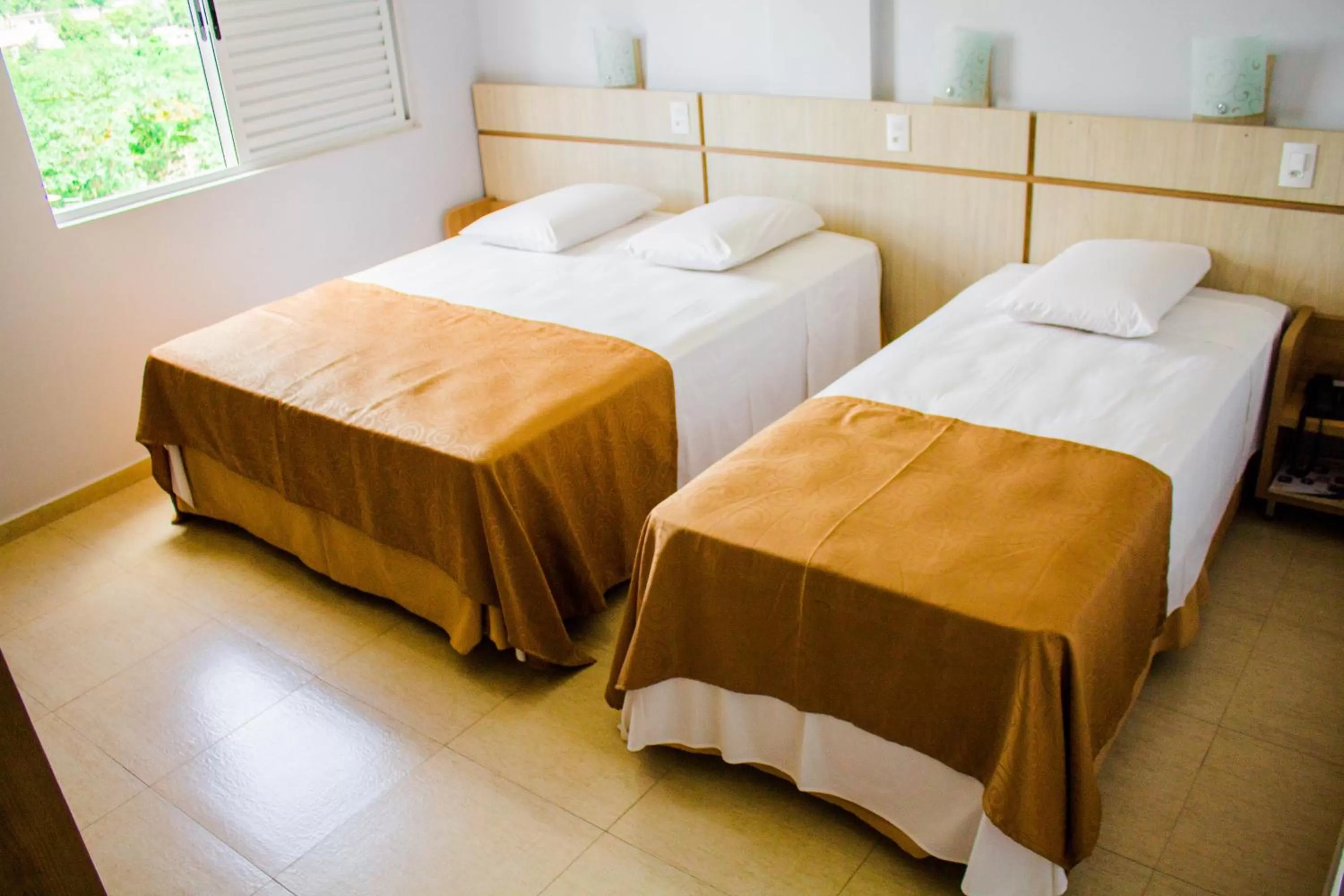 Bed in Hotel Baviera Iguassu