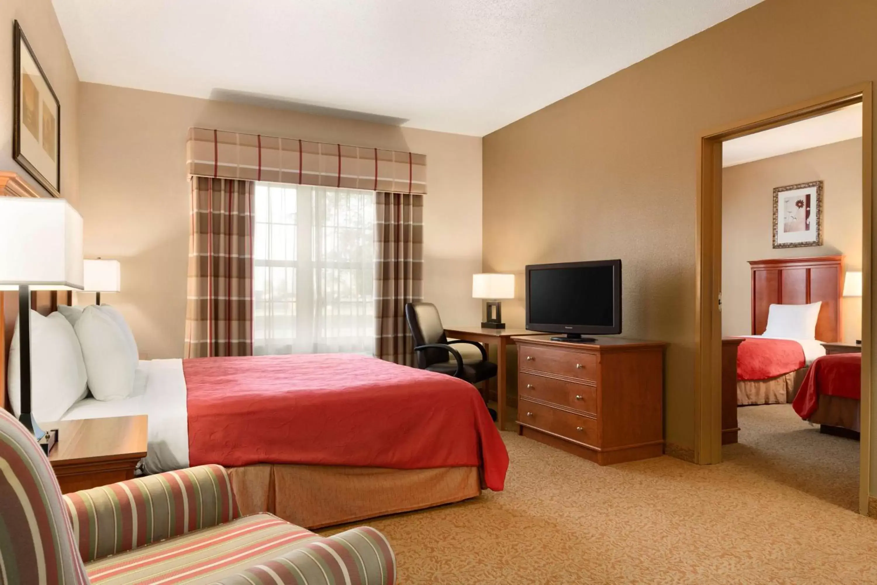 Photo of the whole room, TV/Entertainment Center in Country Inn & Suites by Radisson, Sycamore, IL