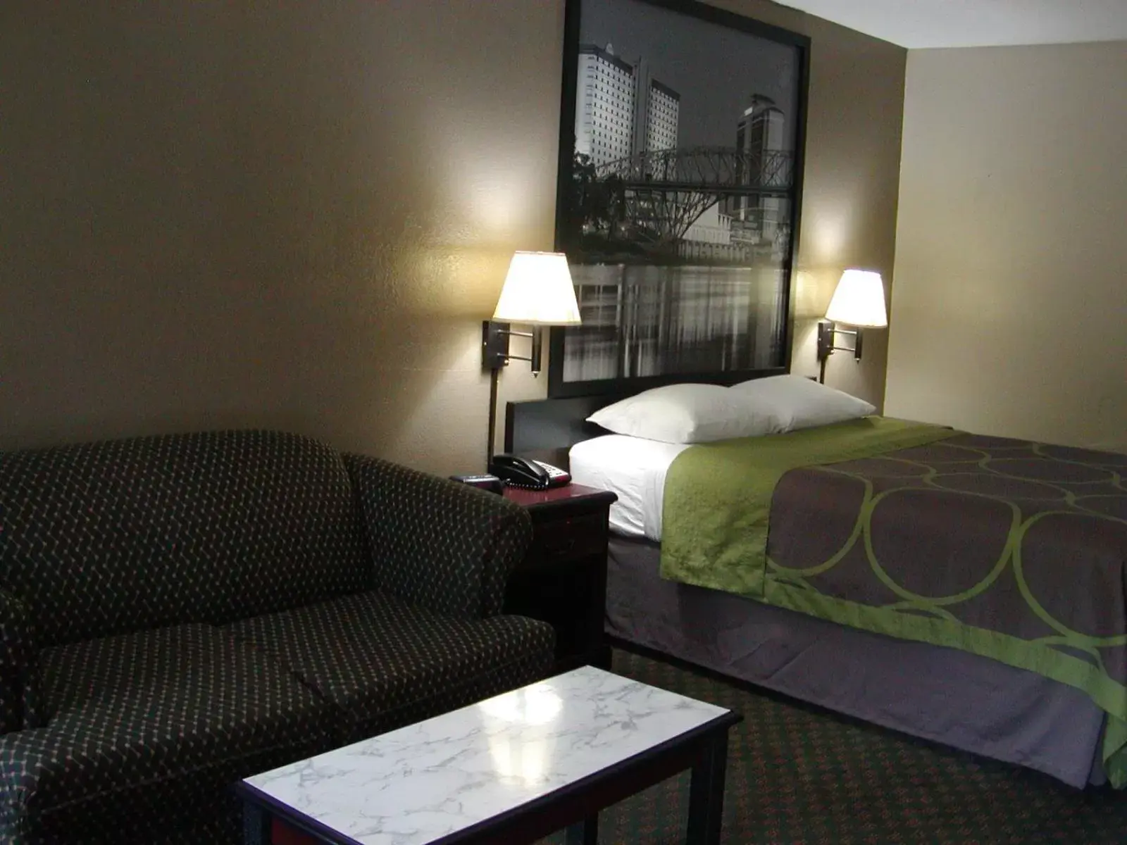 Seating area, Bed in Super 8 by Wyndham Bossier City/Shreveport Area