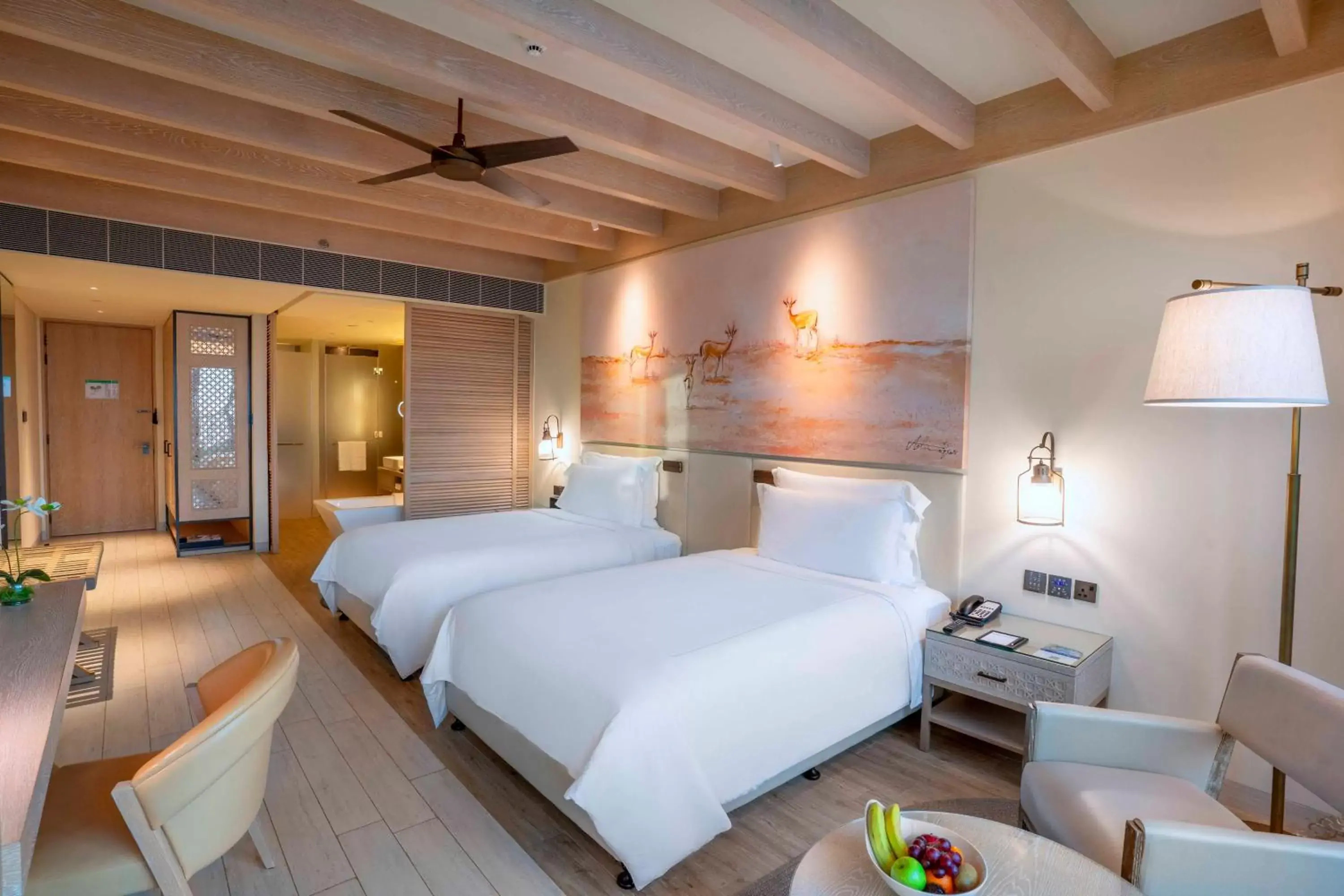 Photo of the whole room, Bed in Saadiyat Rotana Resort and Villas