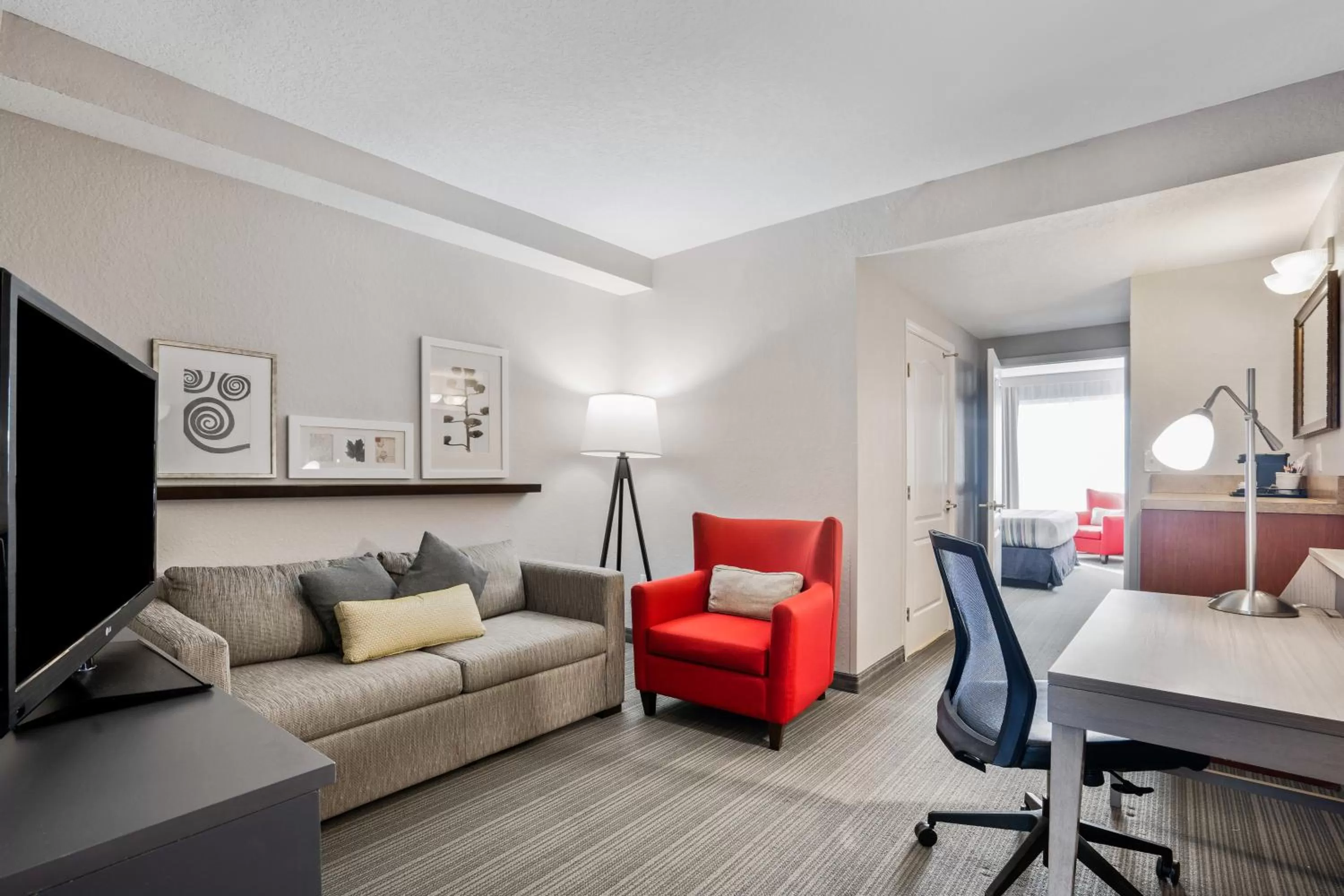 Seating area in Country Inn & Suites by Radisson, Port Canaveral, FL