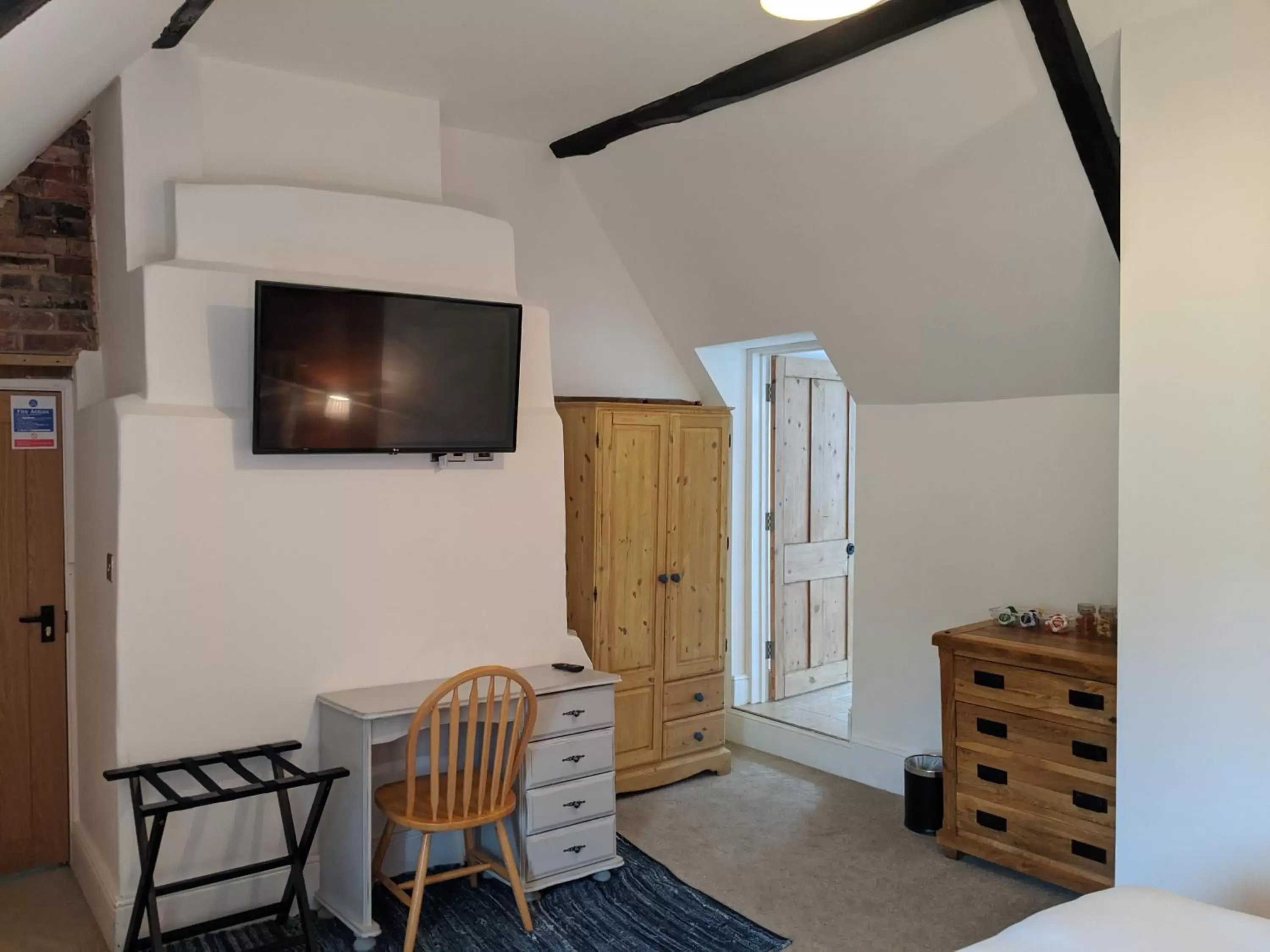 Bedroom, TV/Entertainment Center in Elderbrook House