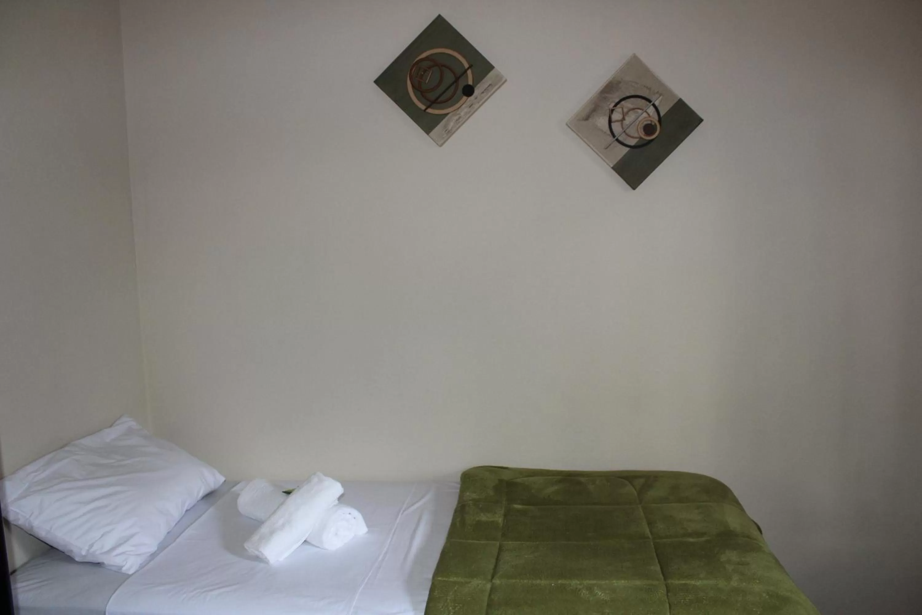 Bed in Pousada Morro dos Ventos