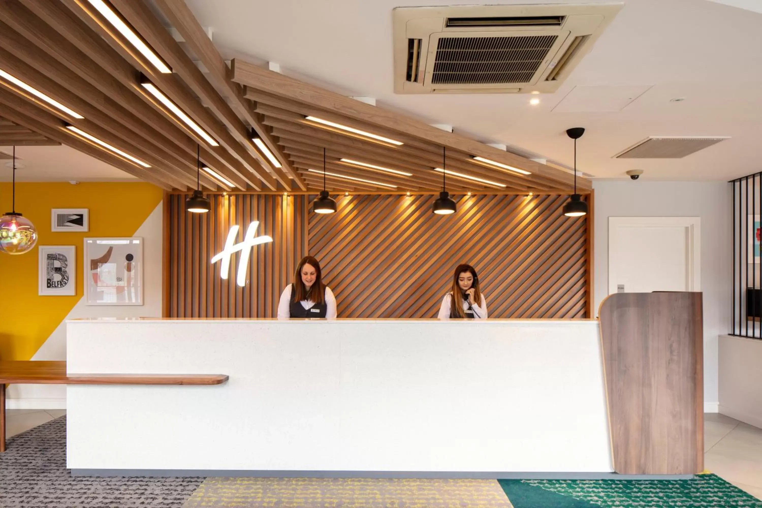 Lobby or reception in Holiday Inn Belfast by IHG Lobby or reception in Holiday Inn Belfast by IHG