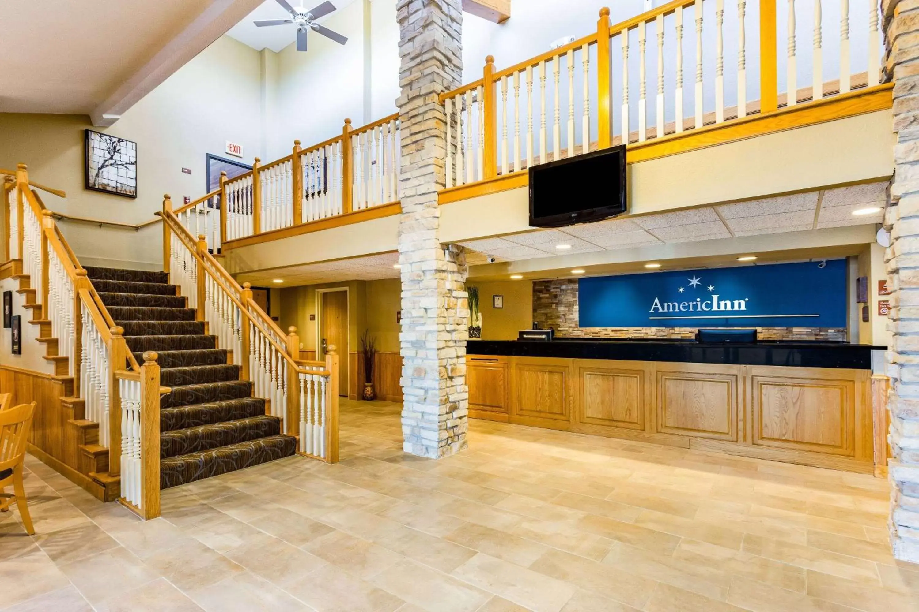 Lobby or reception in AmericInn by Wyndham Hotel and Suites Long Lake