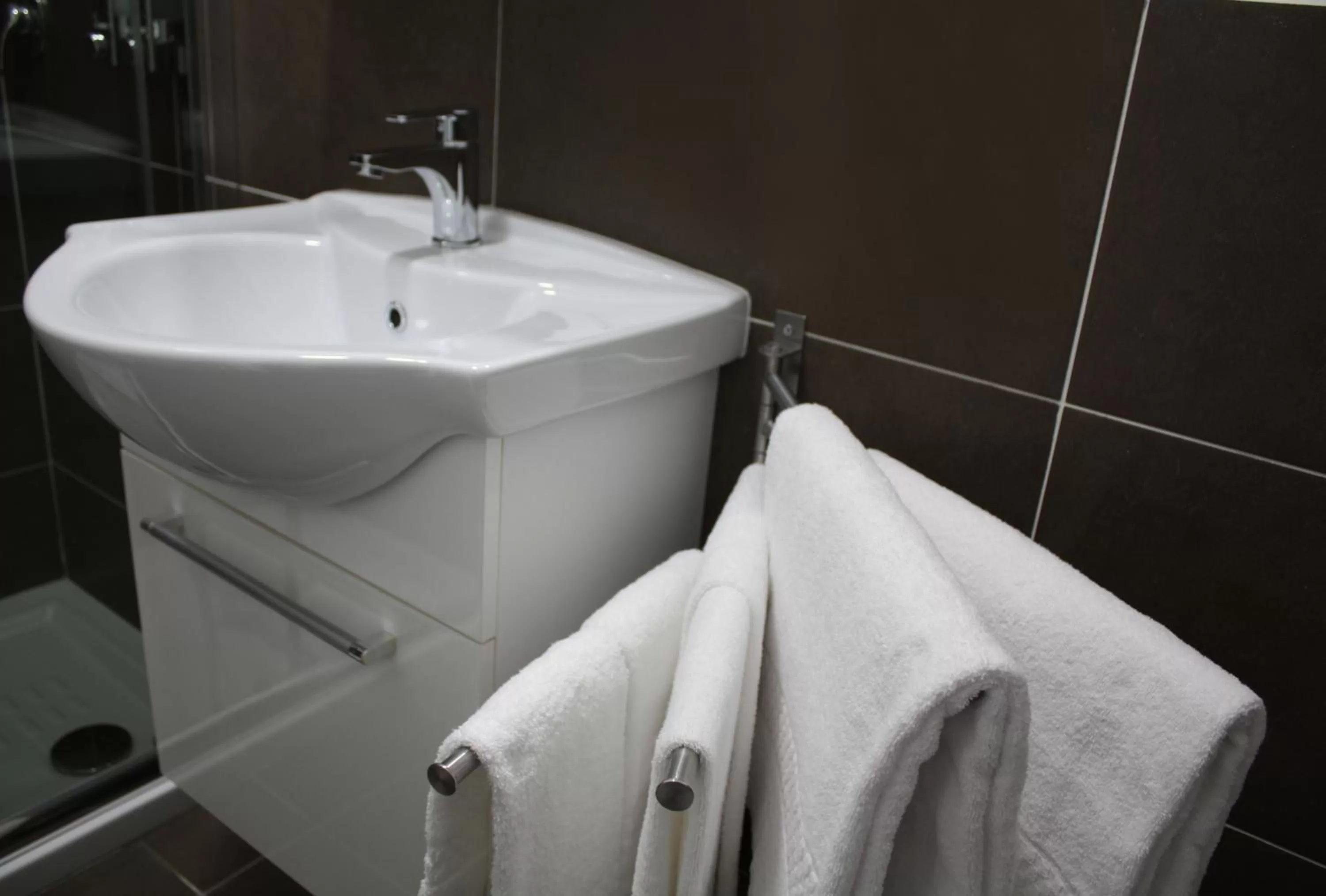 Bathroom in Roma Resort Colosseum