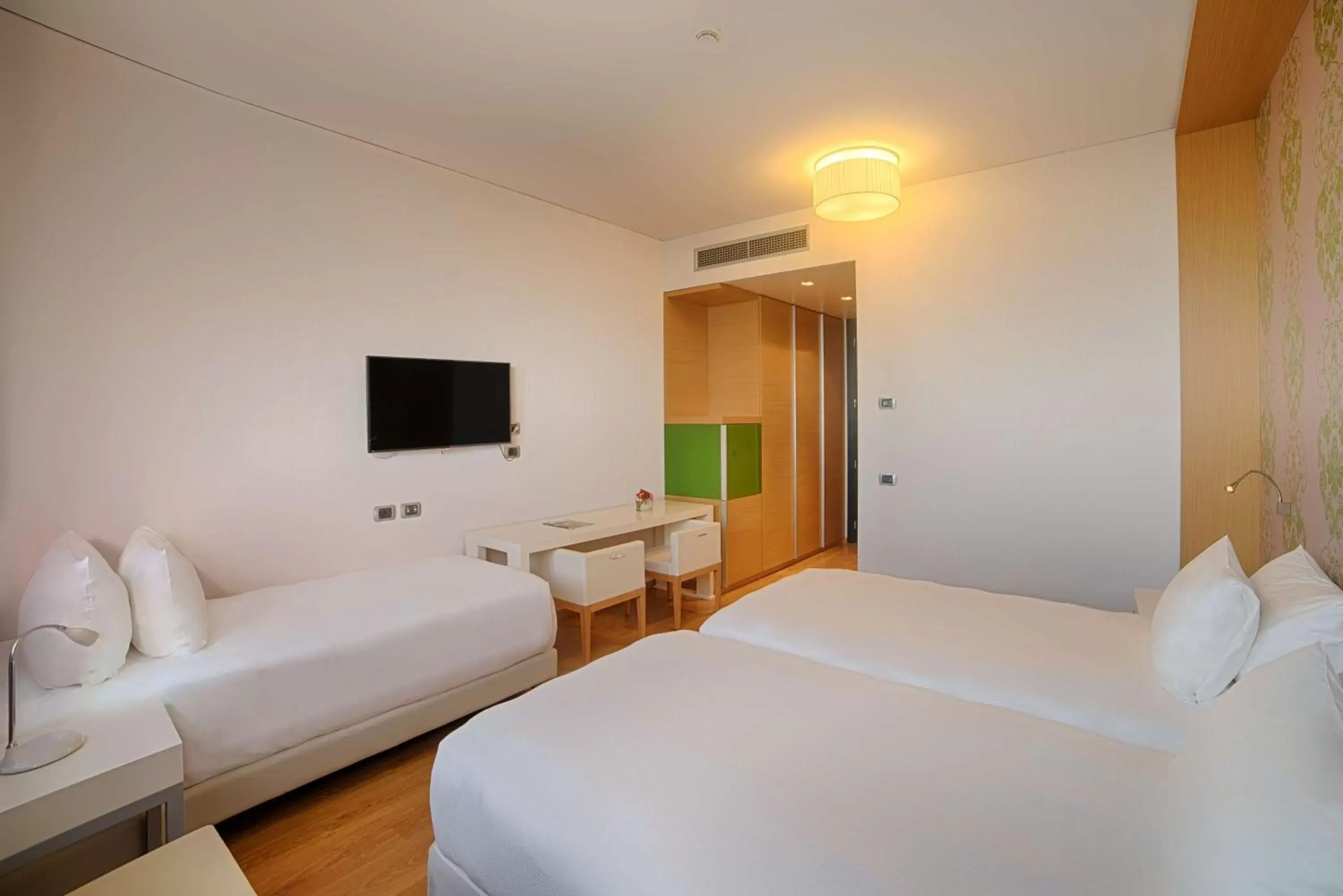 Bedroom in NH Milano Fiera