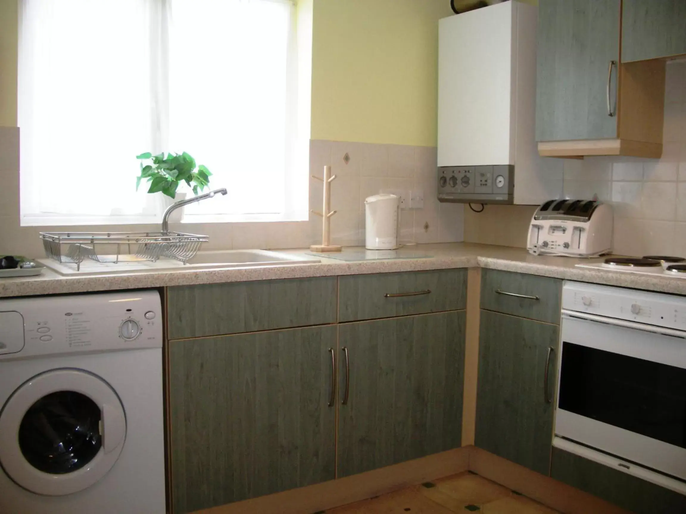 Kitchen or kitchenette, Kitchen/Kitchenette in Penny Farthing Hotel & Cottages