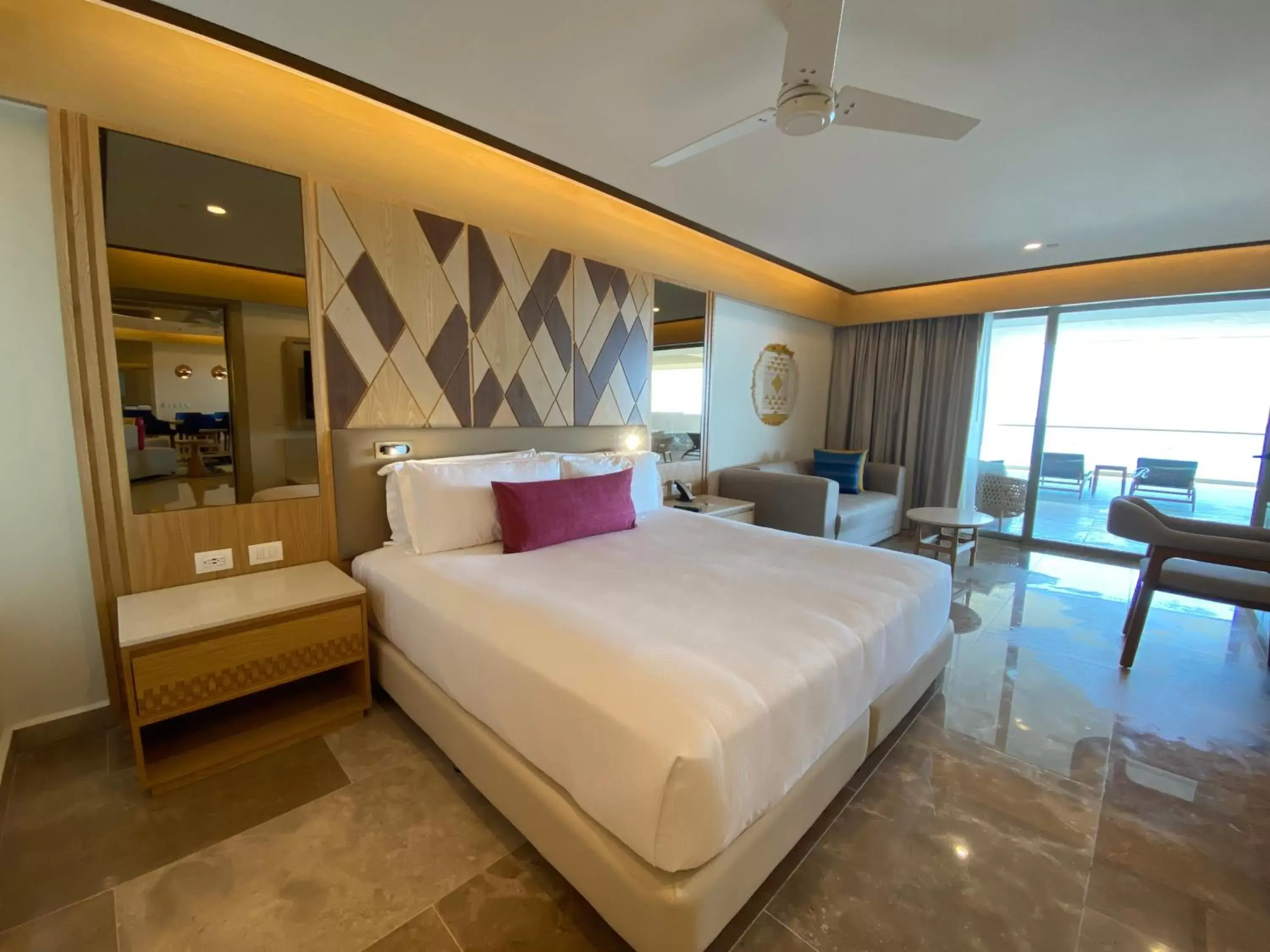 Bed in Royalton Splash Riviera Cancun, An Autograph Collection All-Inclusive Resort