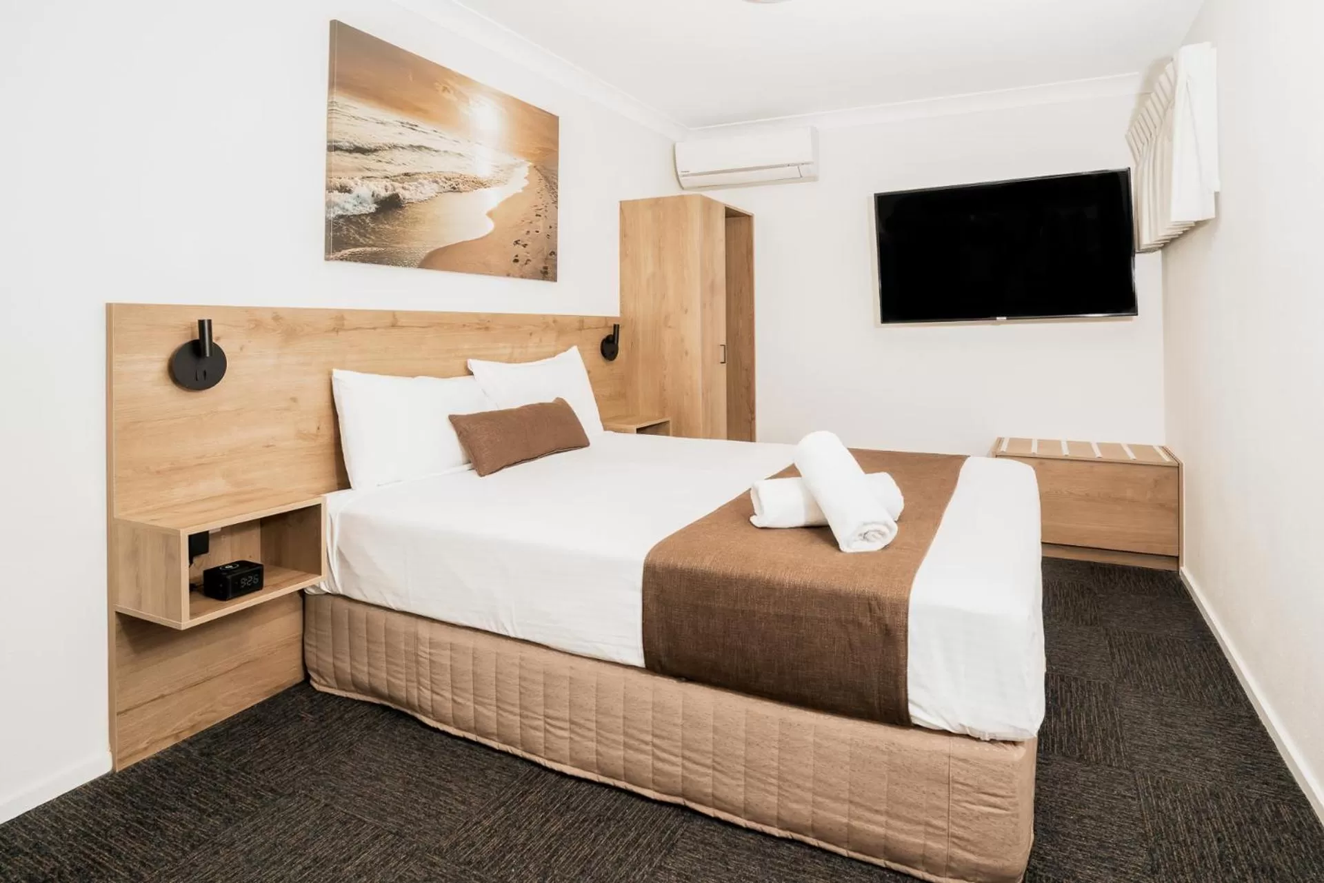 Bed in Caribbean Motel