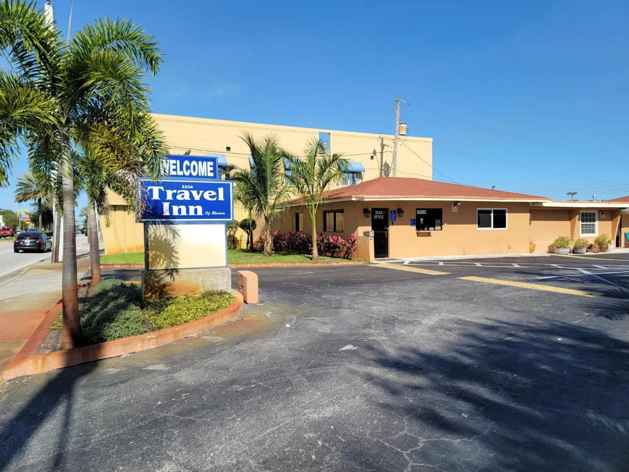 Property logo or sign, Property Building in Travel Inn of Riviera Beach