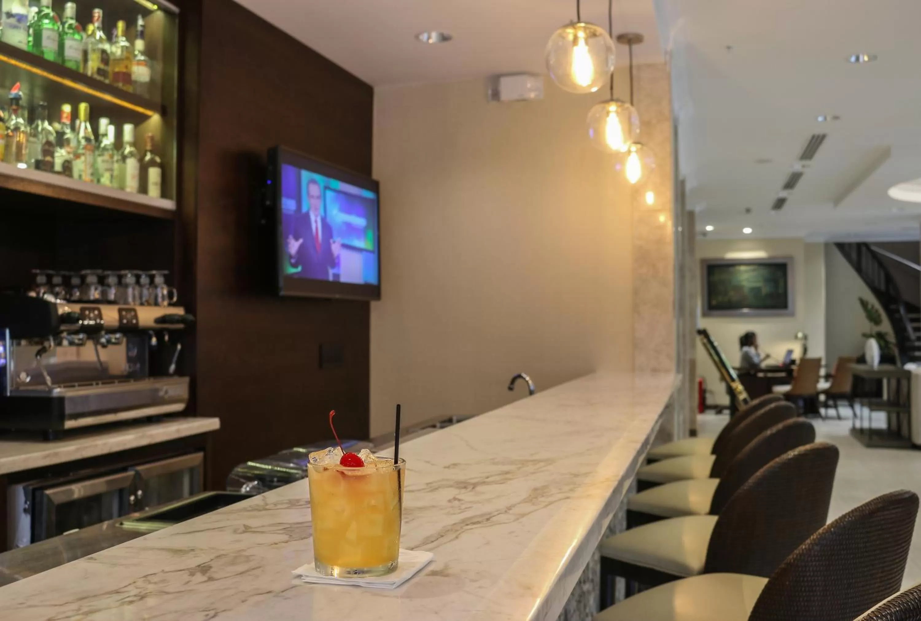 Lounge or bar in The Executive Hotel