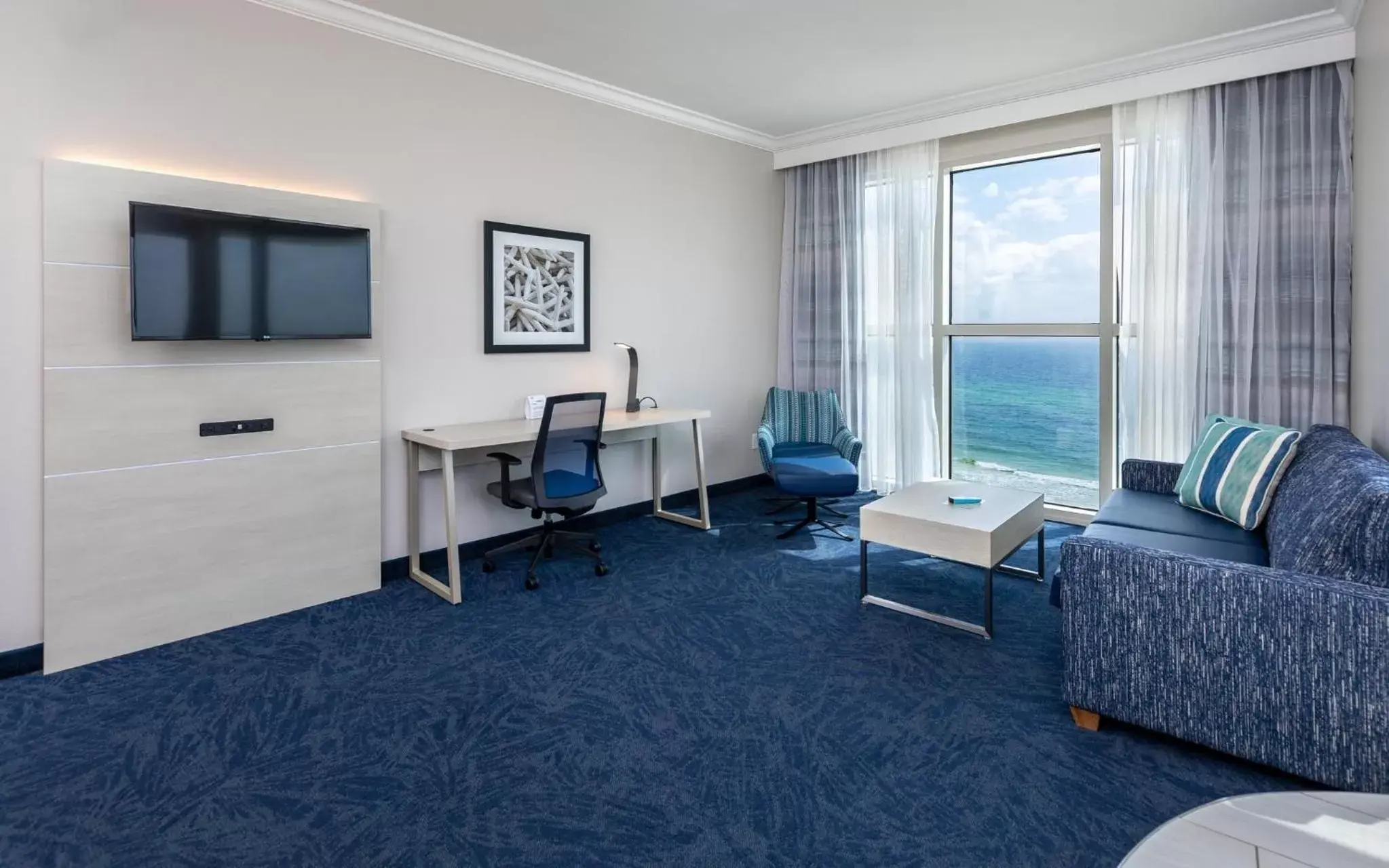 Photo of the whole room, Seating Area in Holiday Inn Express Pensacola Beach, an IHG Hotel