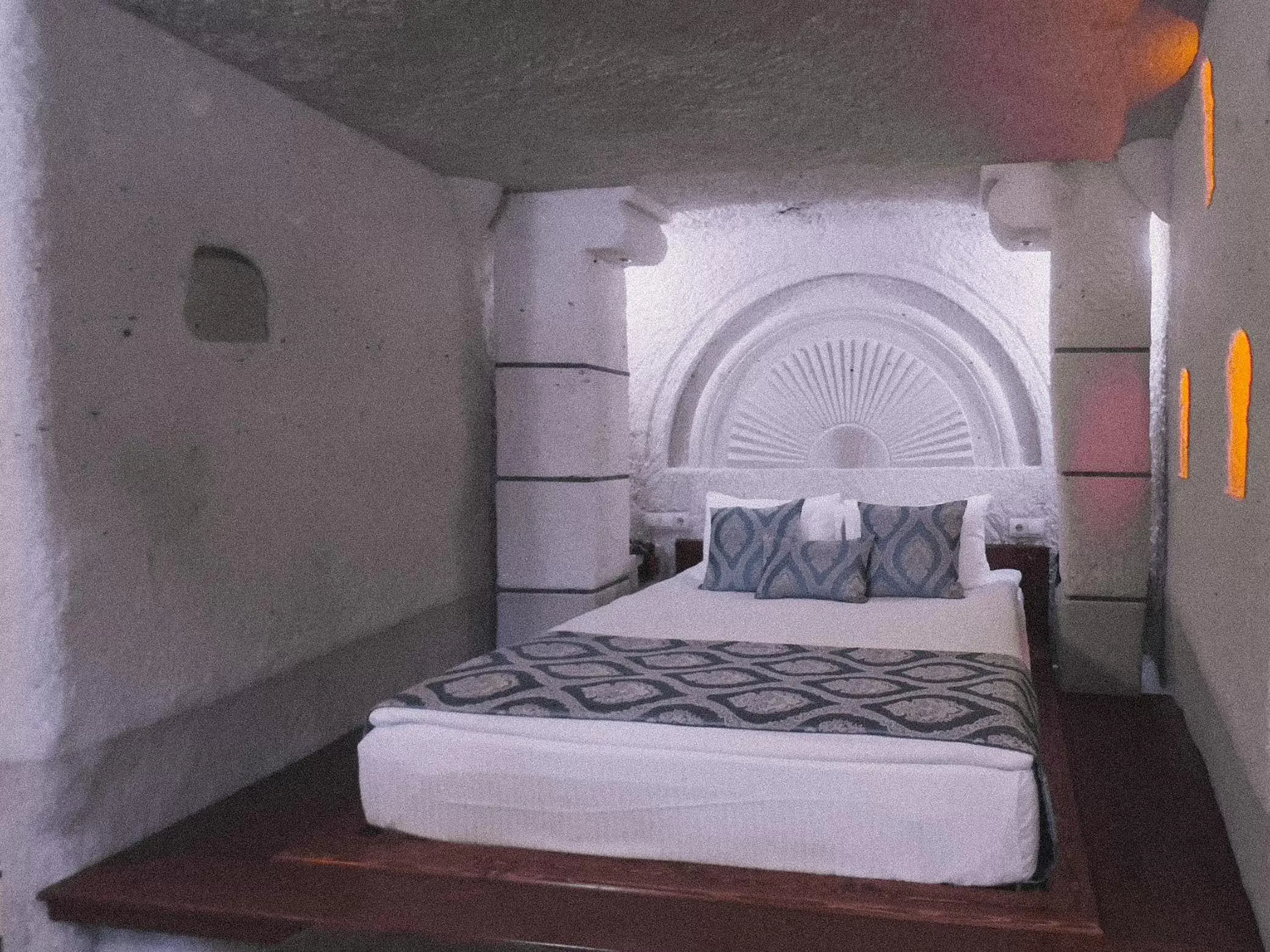 Bed in Local Cave House Hotel