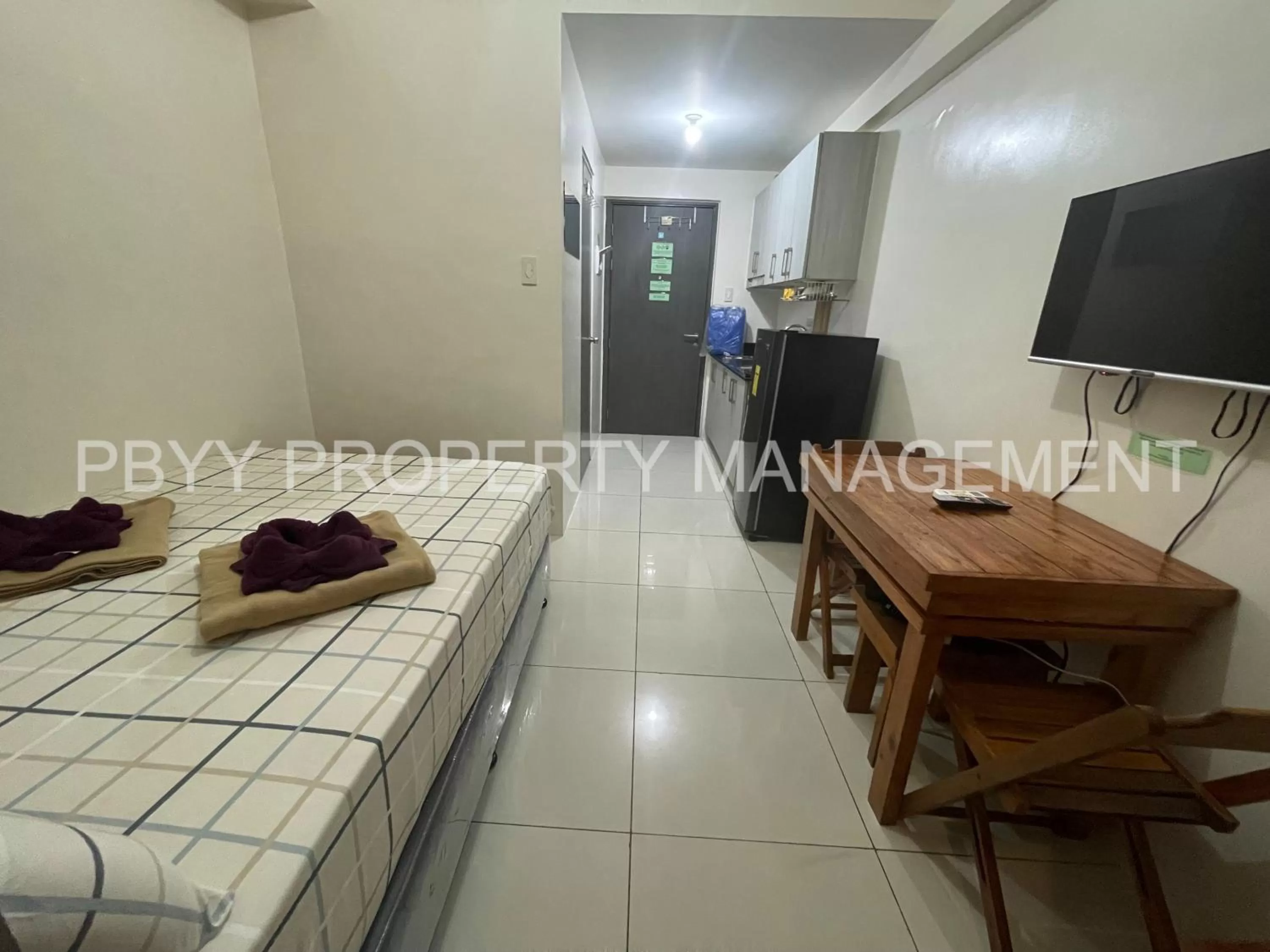 TV and multimedia in Green Residences Staycation by PBYY