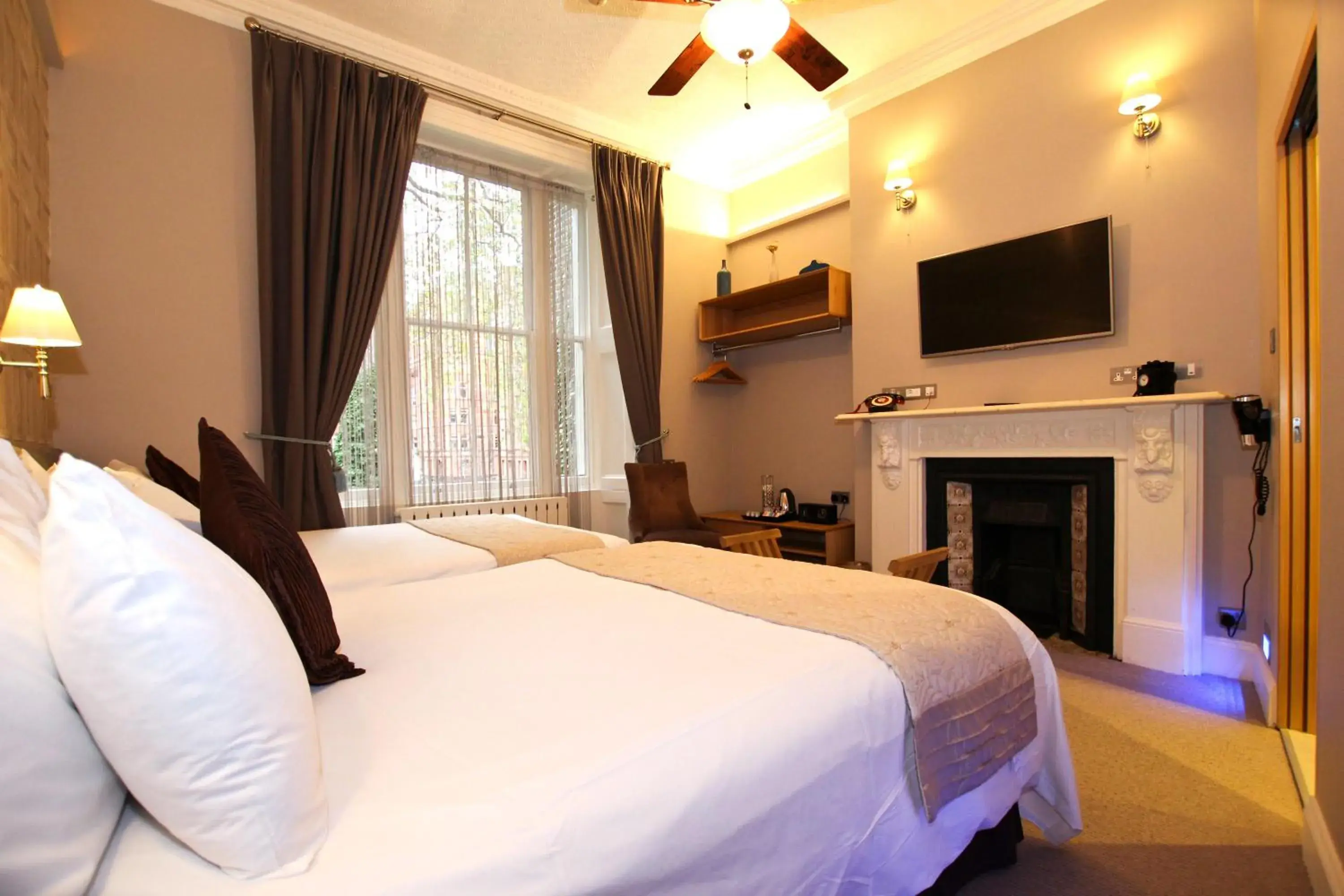 Garden view, Bed in Arosfa Hotel London by Compass Hospitality