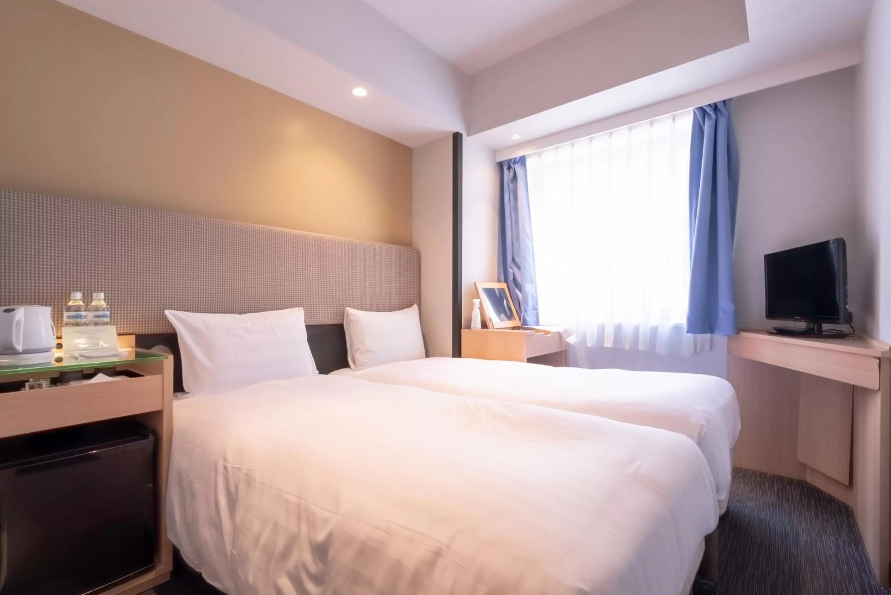 Bed in E Hotel Higashi Shinjuku