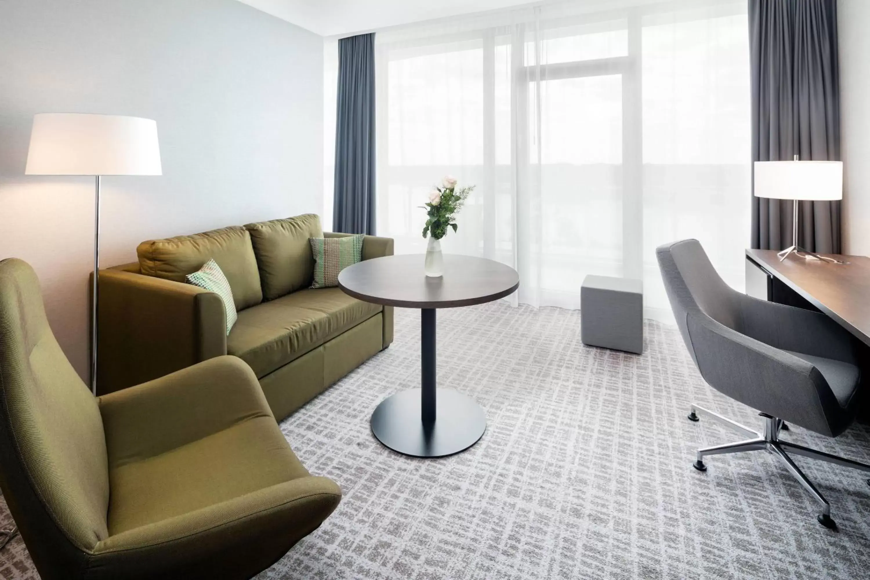 Living room, Seating Area in Courtyard by Marriott Wolfsburg