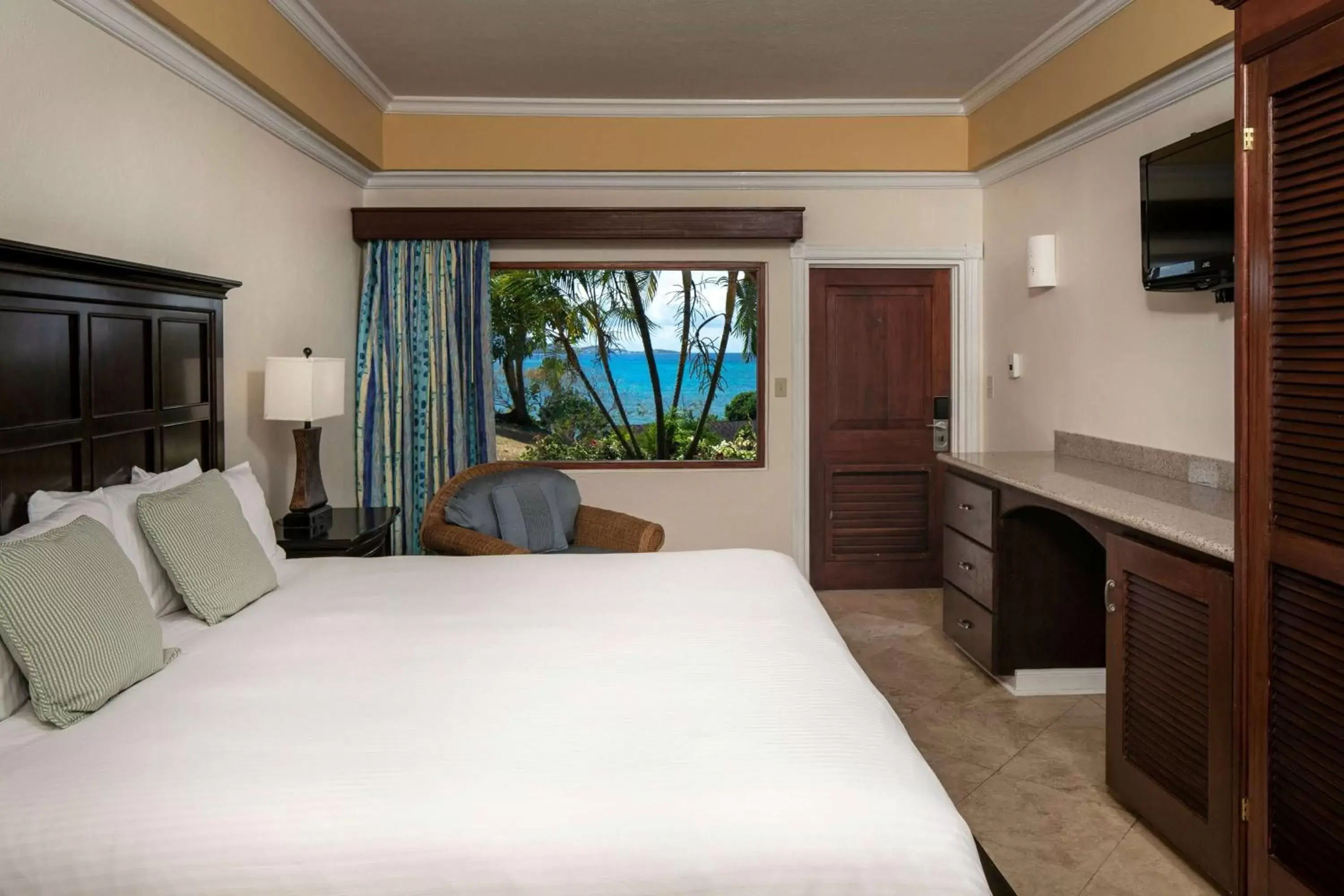 Bed in The Buccaneer Beach & Golf Resort