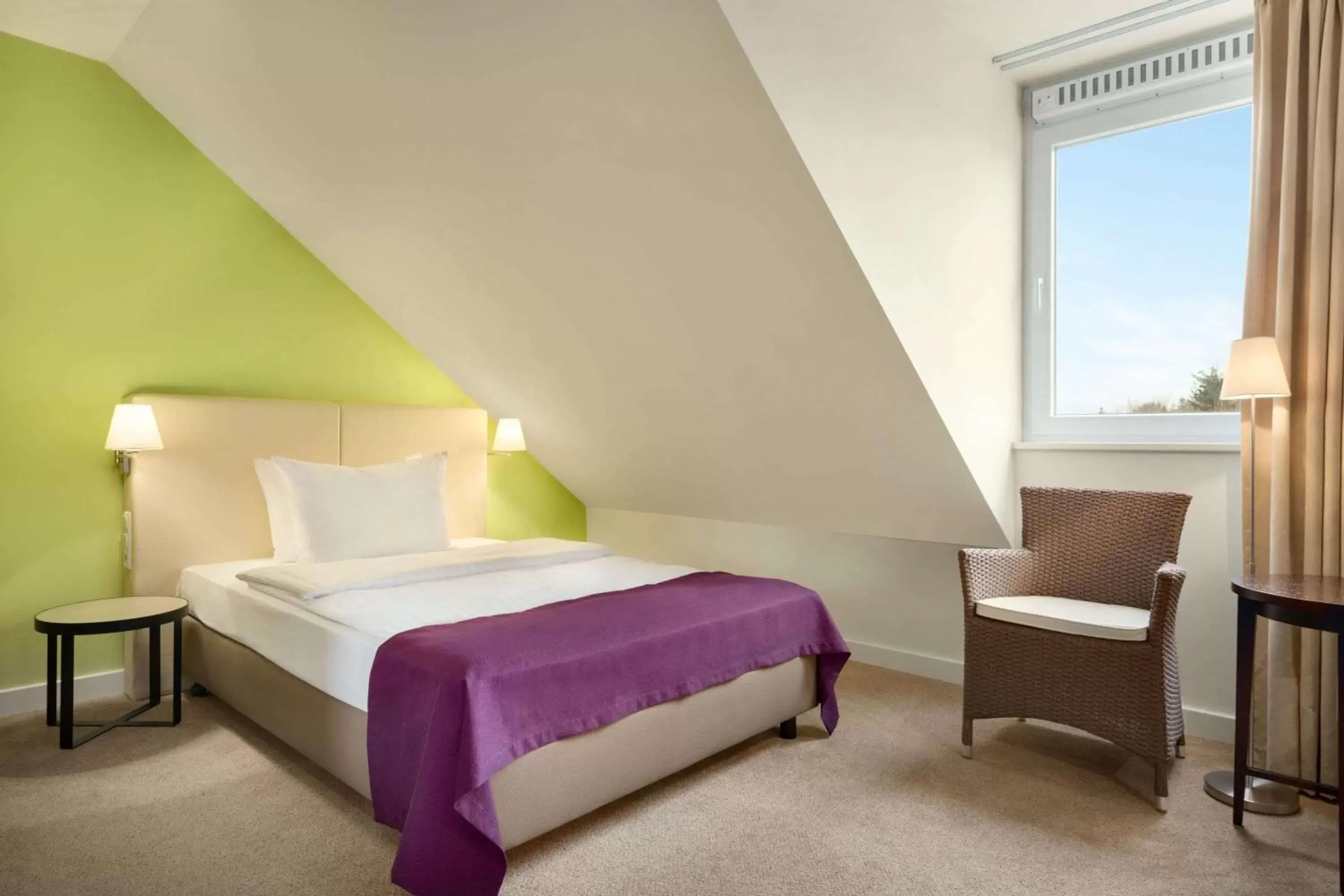 Photo of the whole room, Bed in Ramada by Wyndham München Airport Photo of the whole room, Bed in Ramada by Wyndham München Airport