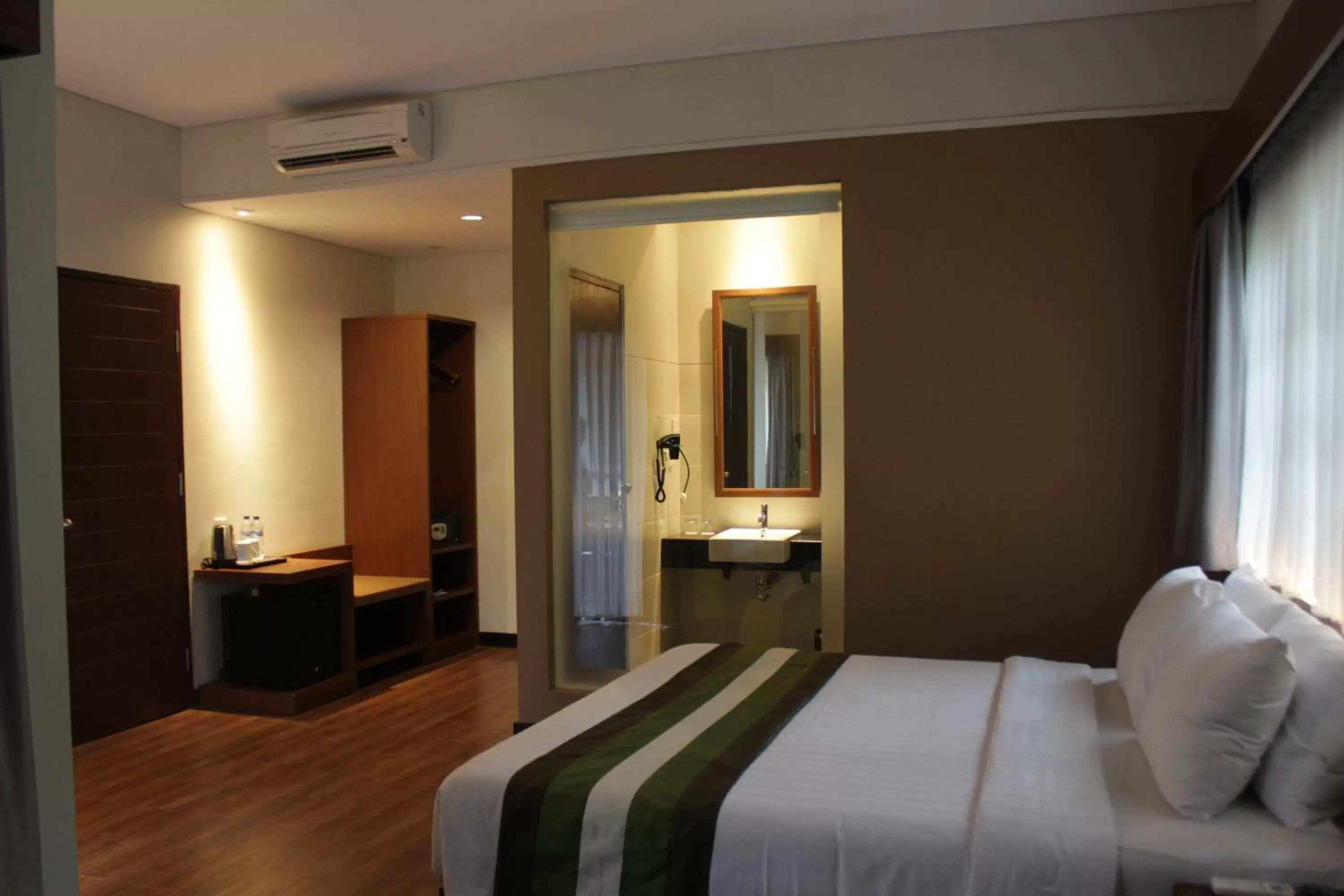 Bed in Grand Whiz Hotel Nusa Dua Bali