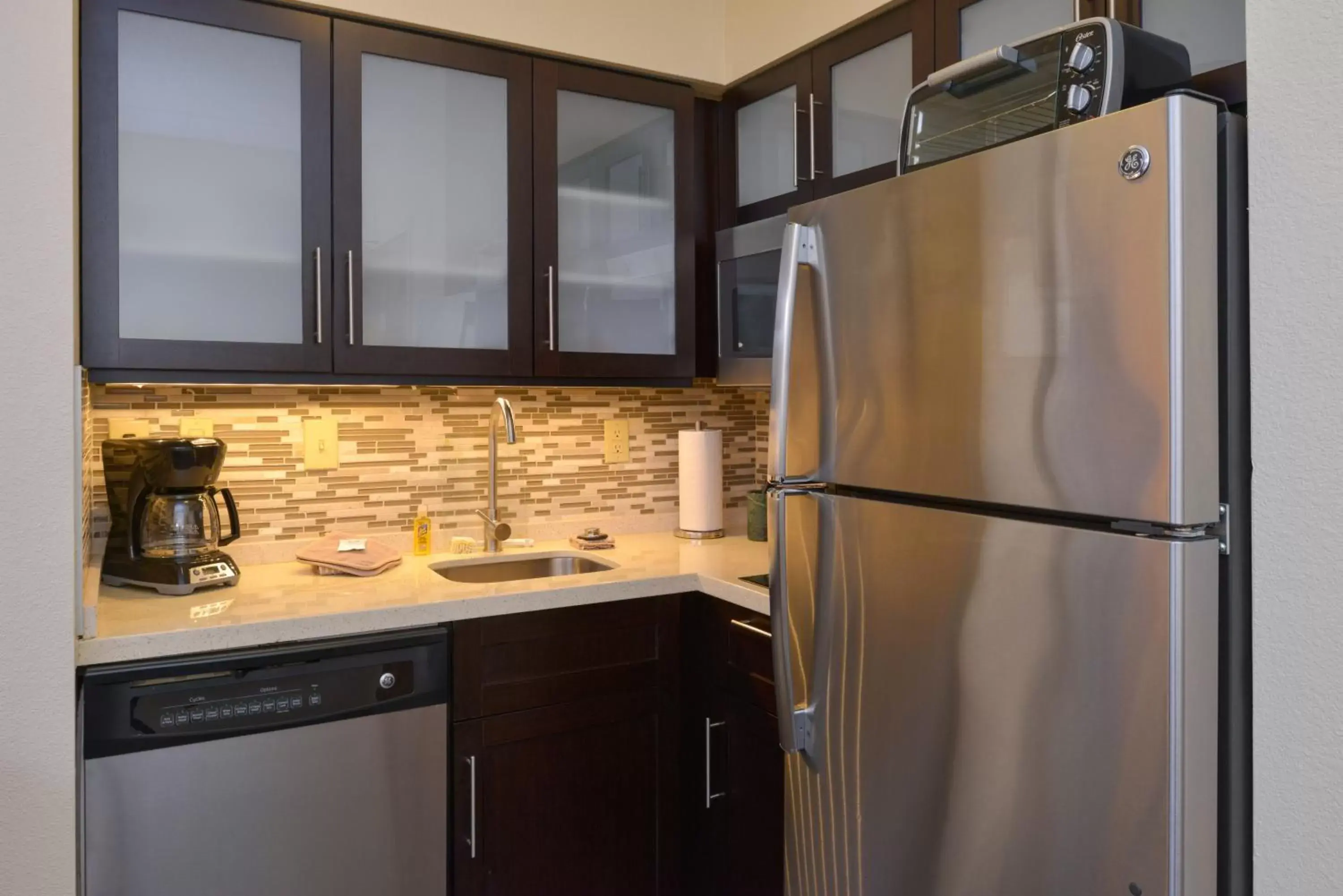 Kitchen or kitchenette, Kitchen/Kitchenette in Staybridge Suites Indianapolis-Fishers, an IHG Hotel