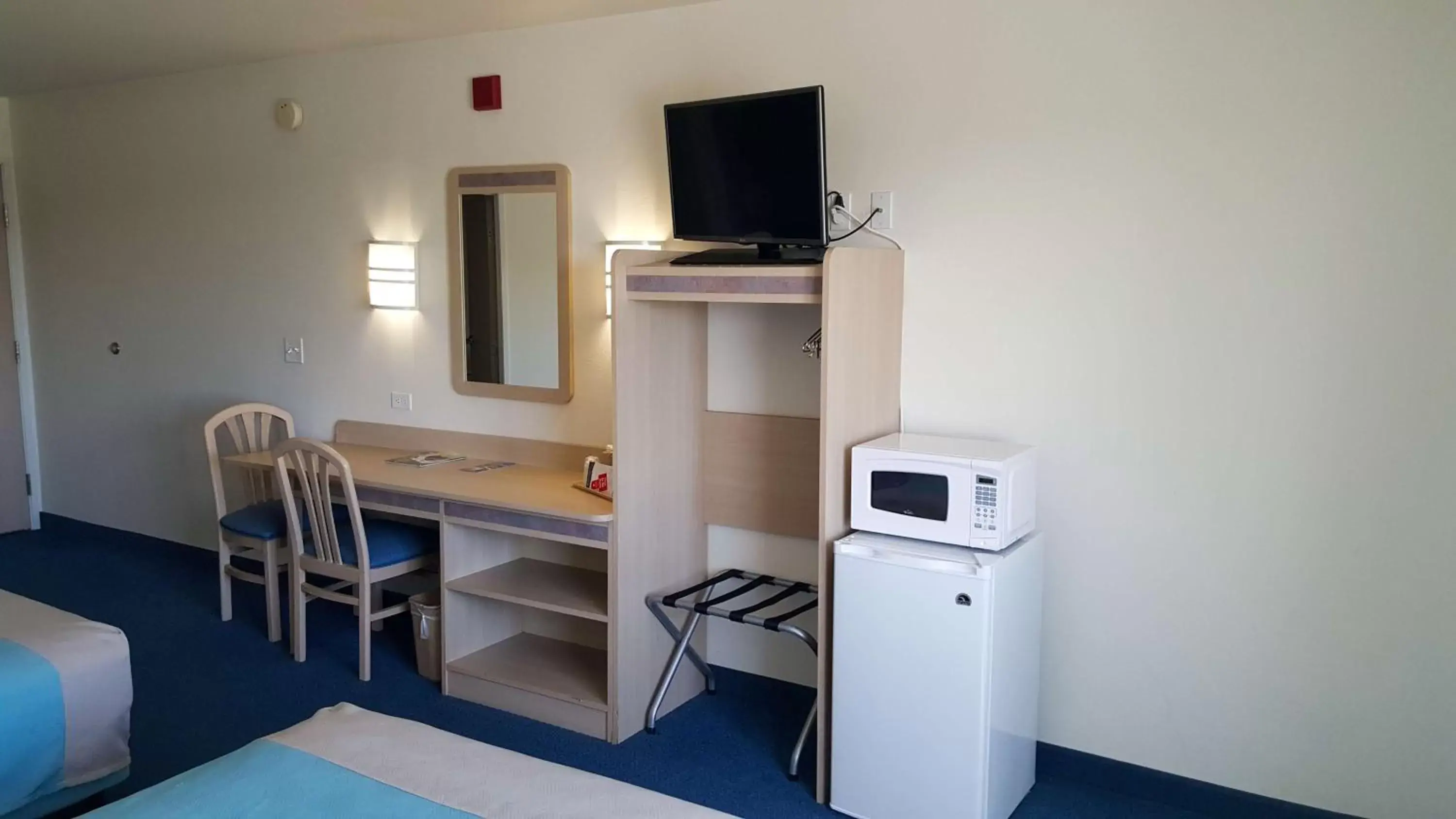 Photo of the whole room, TV/Entertainment Center in Motel 6-Las Cruces, NM - Telshor