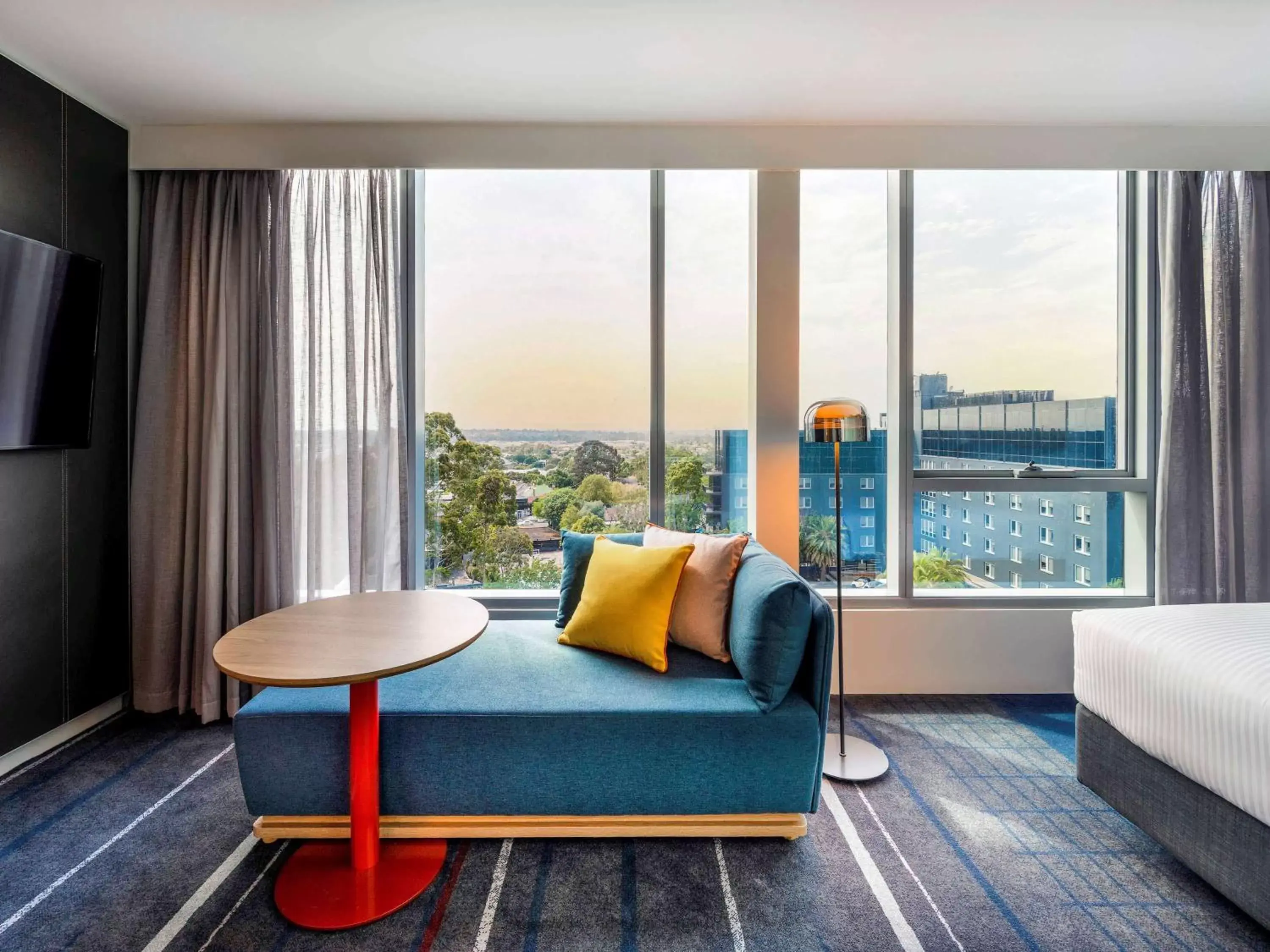 Photo of the whole room, Seating Area in Novotel Melbourne Preston