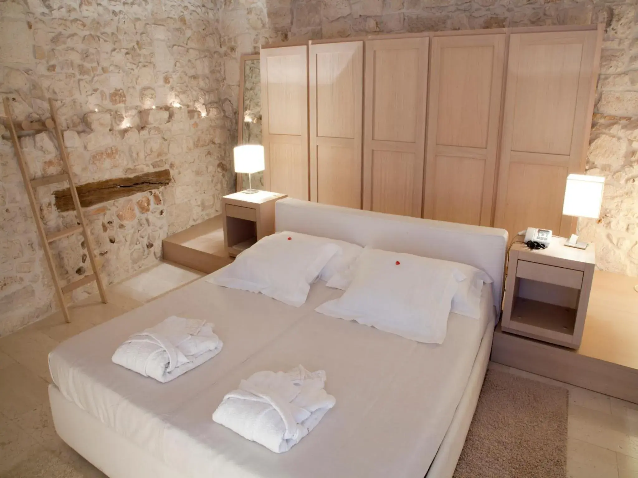 Bed in La Sommita Relais & Chateaux