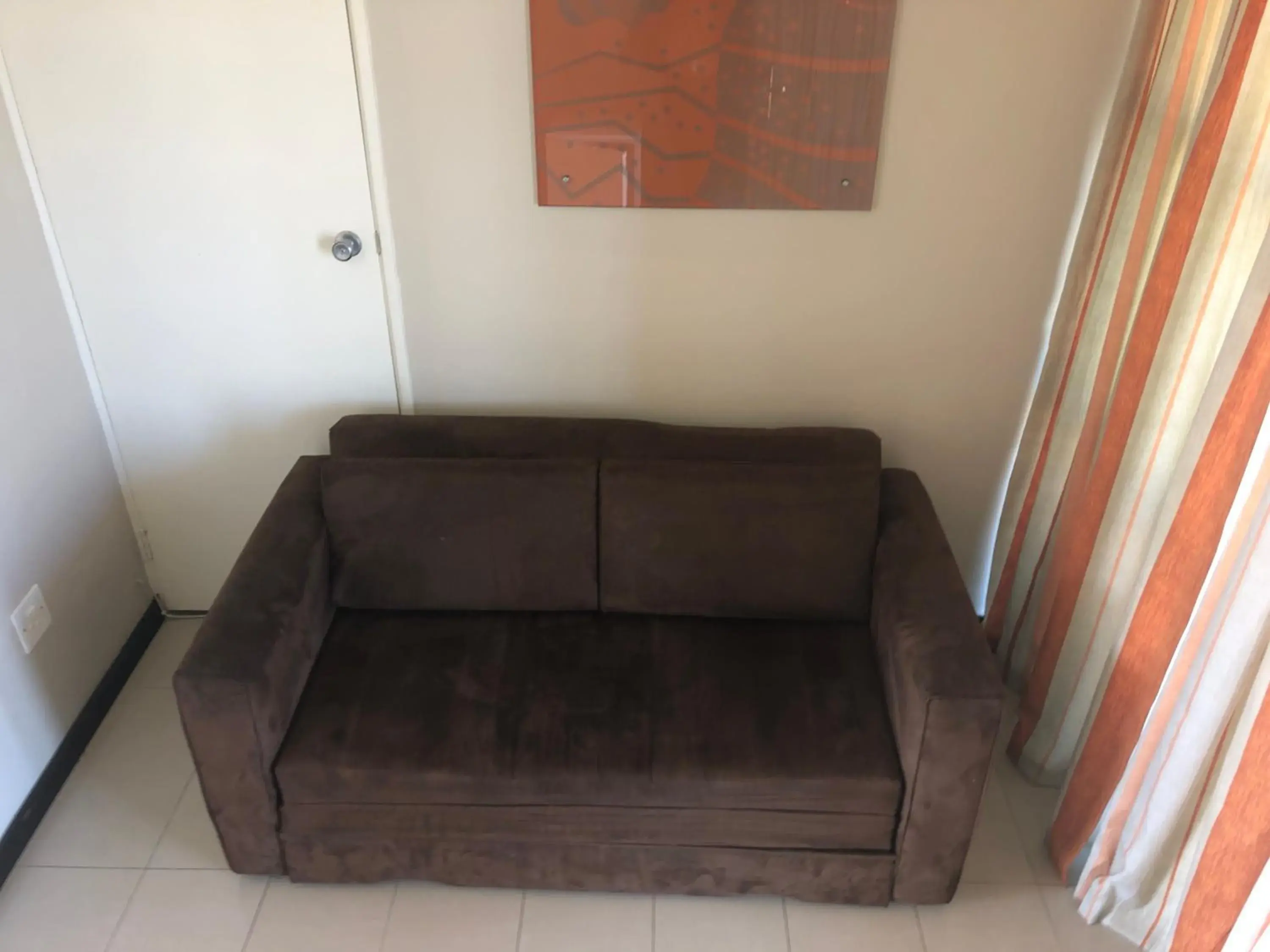 Bed, Seating Area in Coastlands Durban Self Catering Holiday Apartments