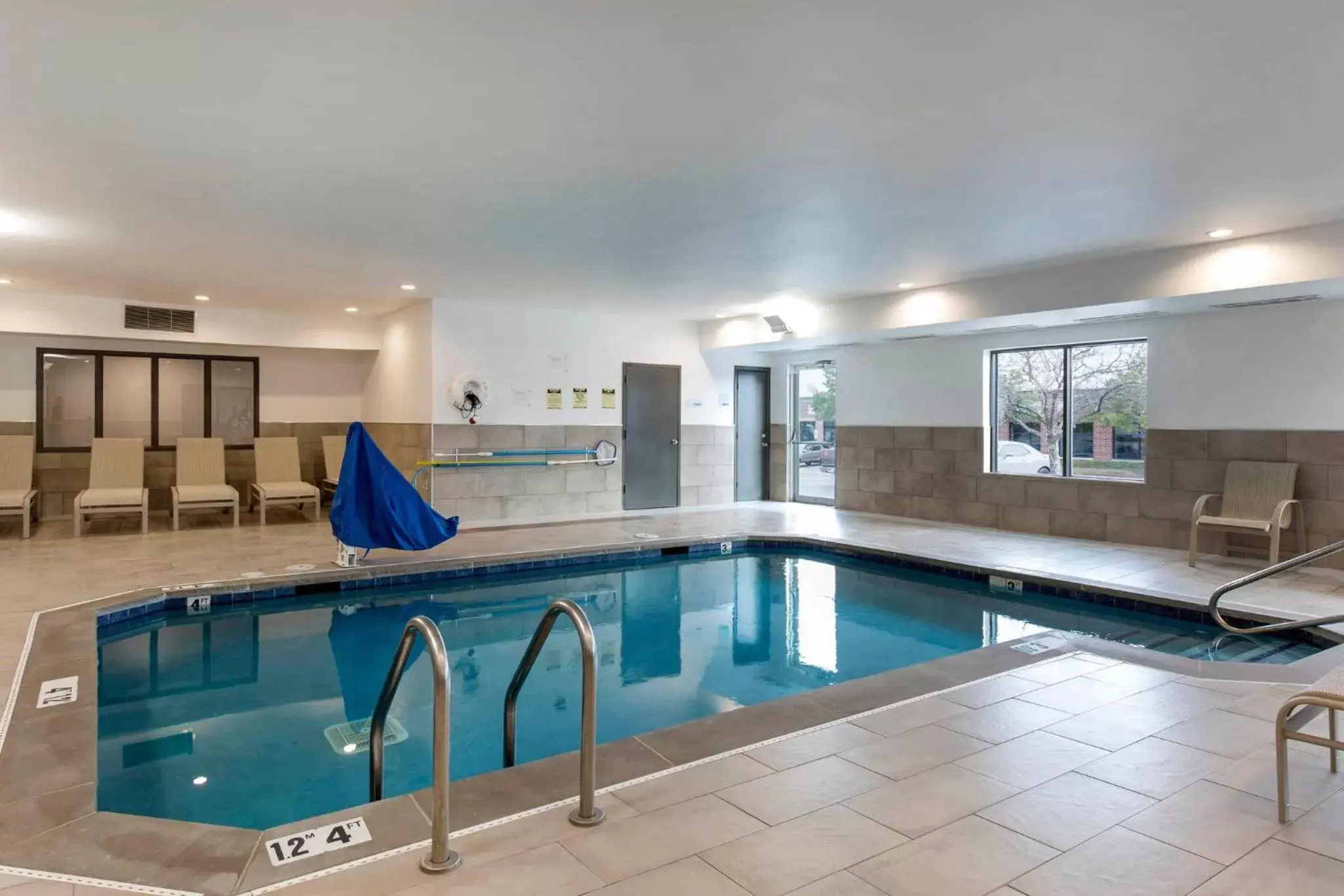 Swimming Pool in Holiday Inn Express and Suites Chicago West - St Charles, an IHG Hotel