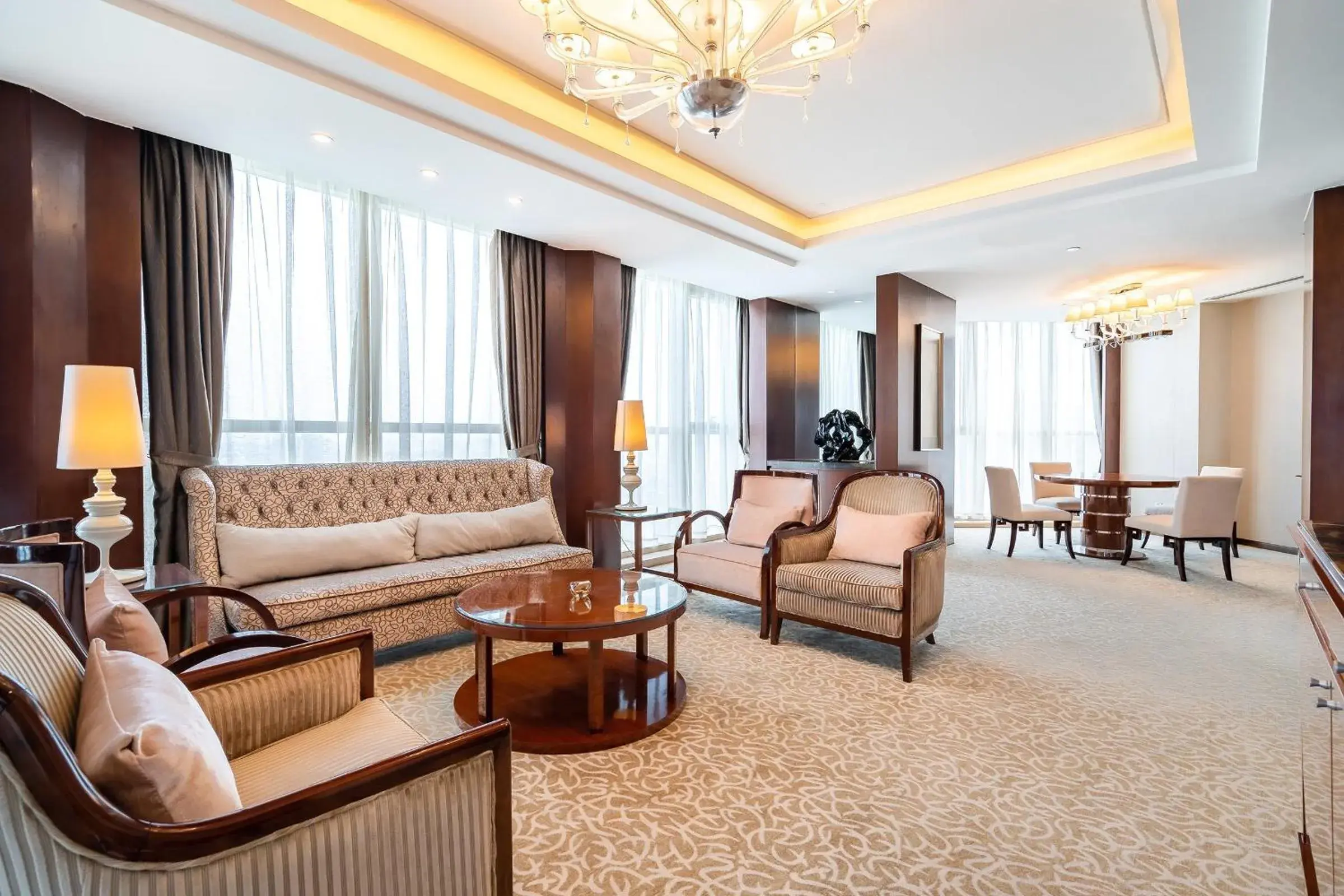 Photo of the whole room, Seating Area in Crowne Plaza Zhenjiang, an IHG Hotel