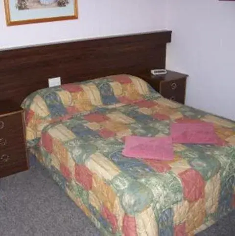 Bed in Figtree Motel